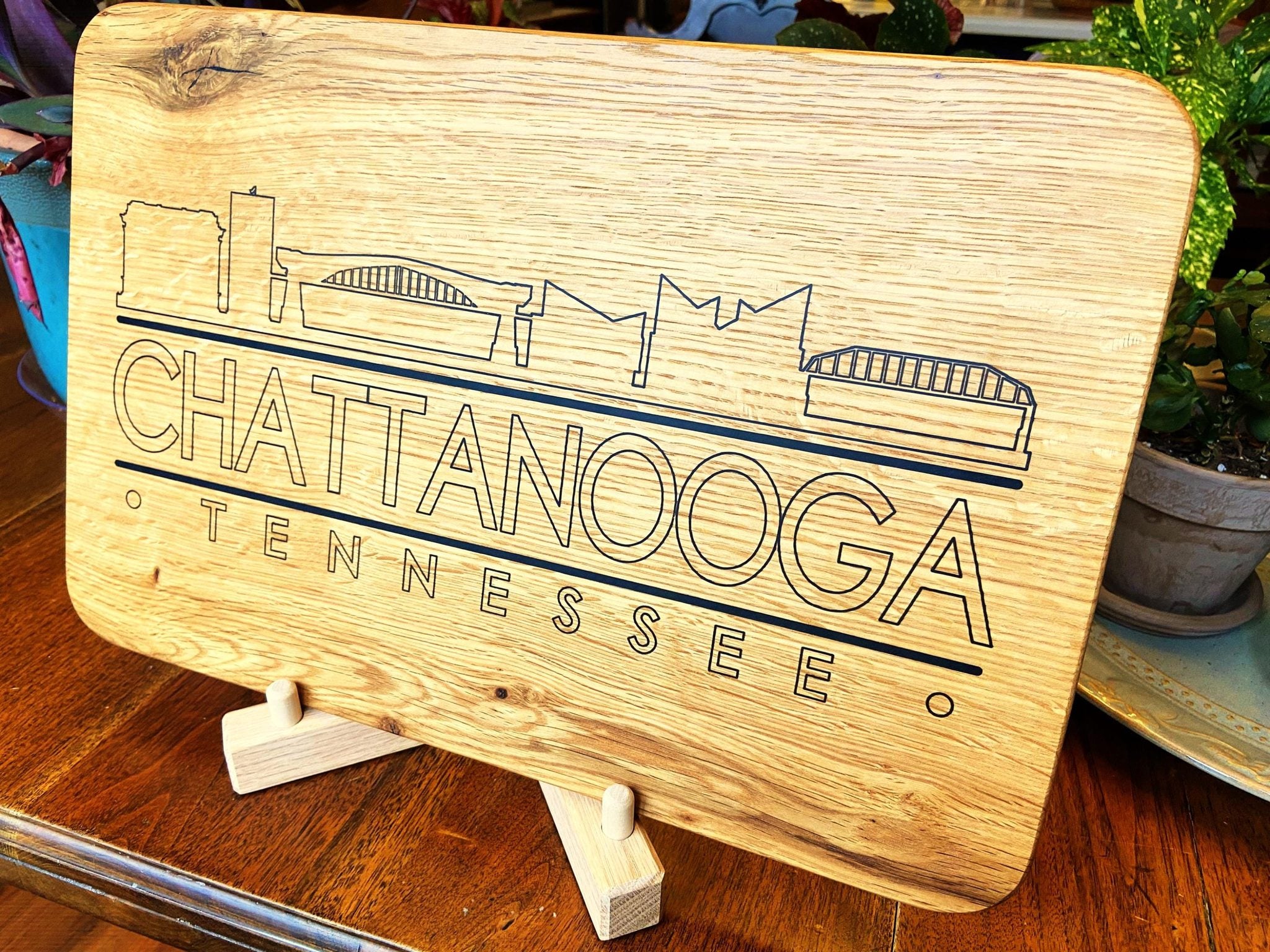 Handmade white oak charcuterie board with engraved Chattanooga skyline