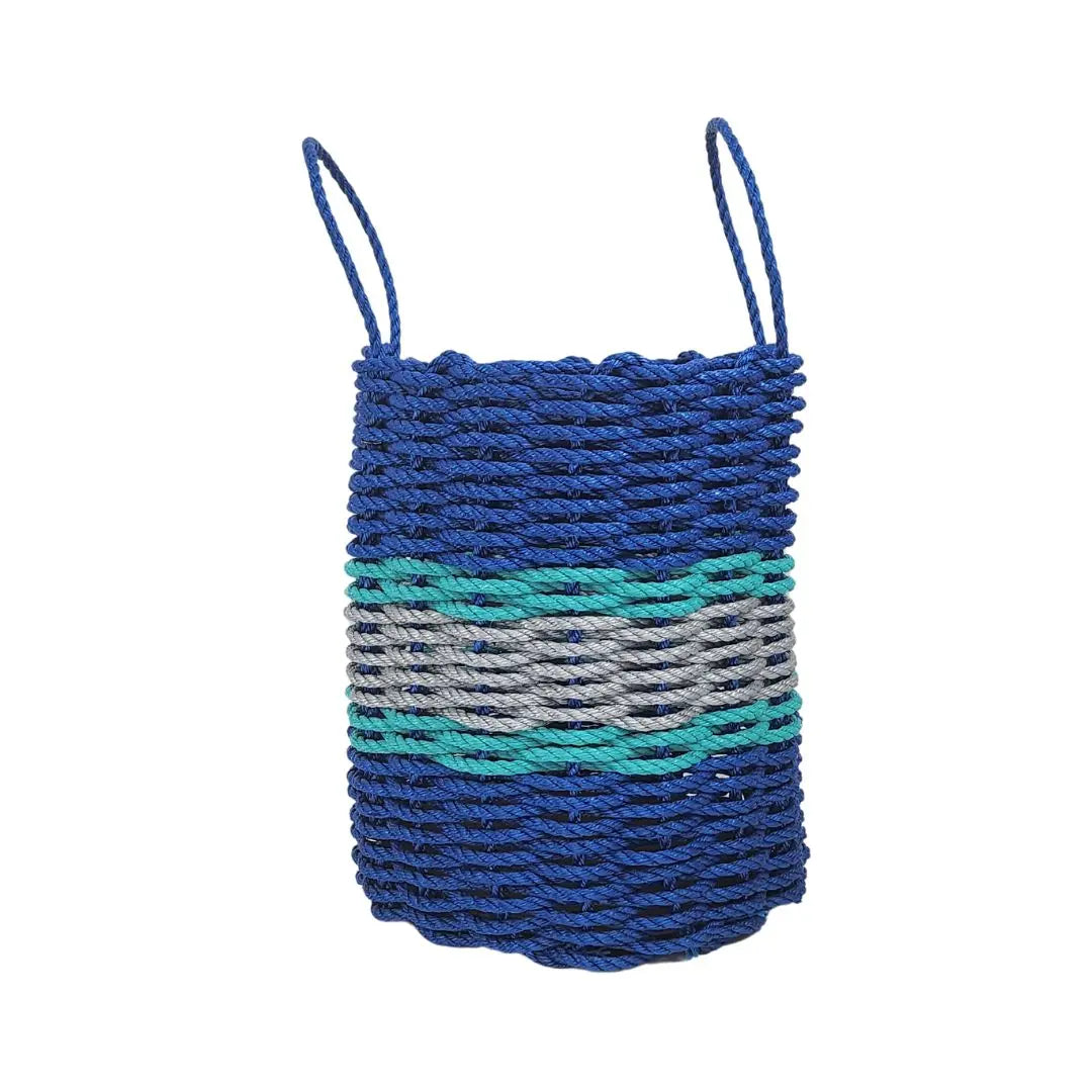 Handmade storage basket woven from blue, light gray, and teal lobster rope