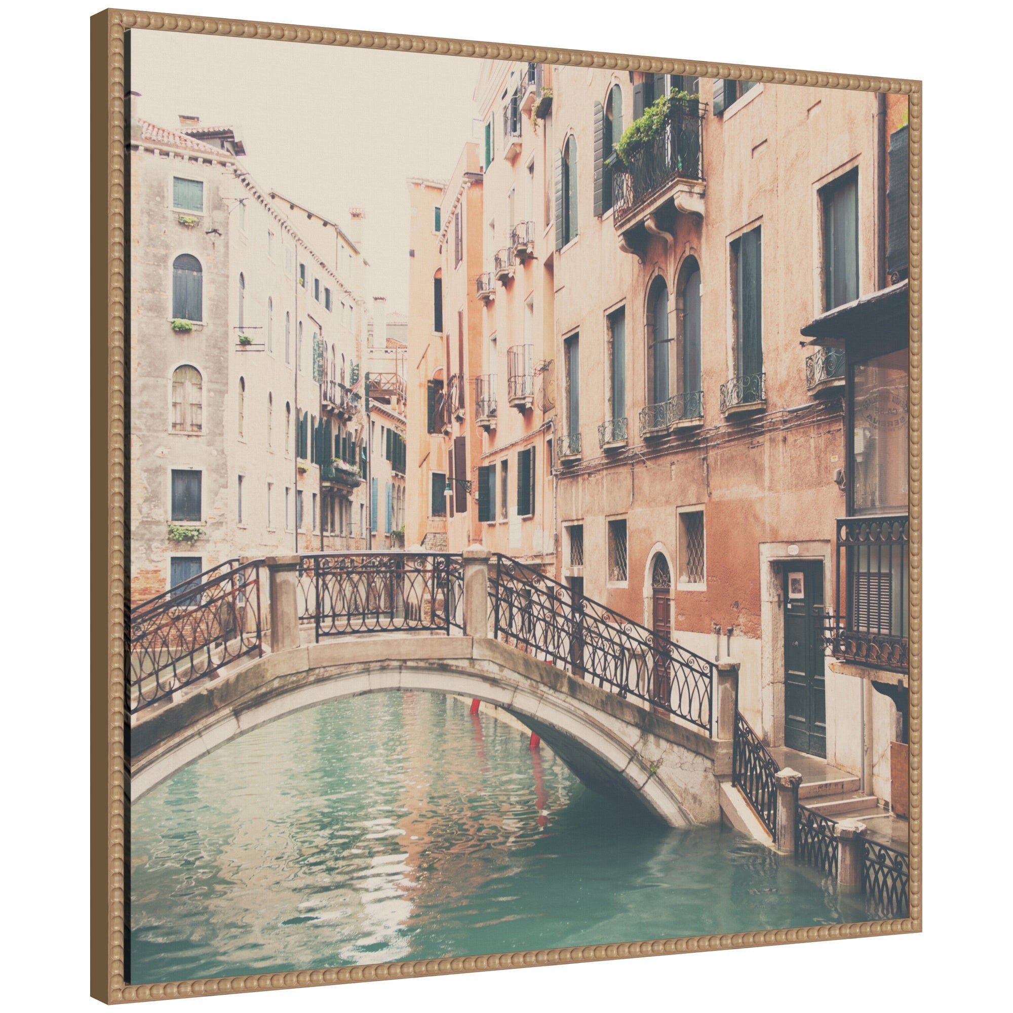 Framed canvas art showing a street scene in Venice with architecture, in a gray polystyrene frame