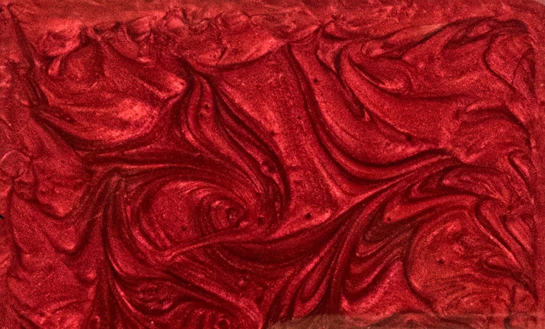 Epoxy Resin Red Pigment Close Over View Showing The Red Swirl Color and design of the epoxy resin.
