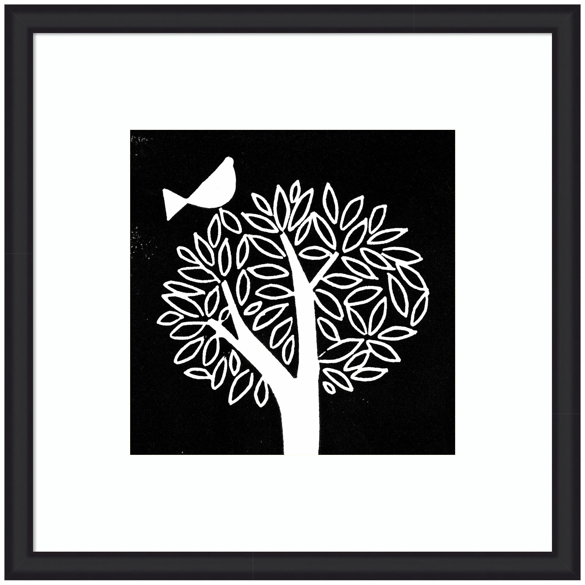 Framed black and white linocut print of a stylized tree with a bird on a branch