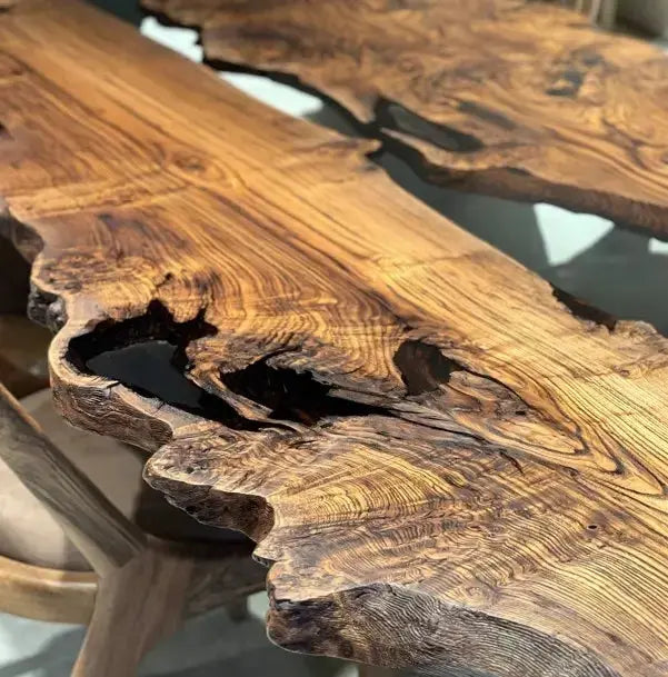 Live edge chestnut wood dining table with epoxy resin river and black legs