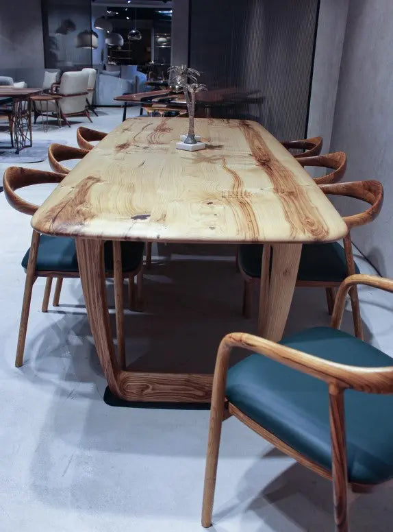 Rustic solid chestnut wood dining table with chestnut legs showing natural grain and knots