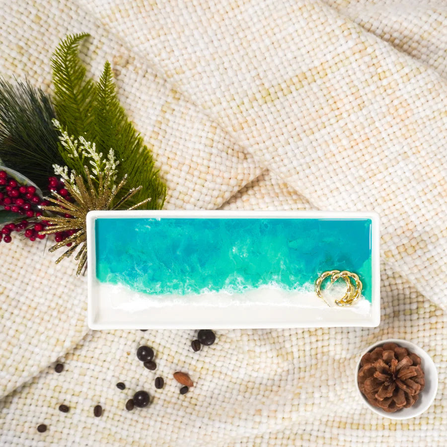 Small Ceramic Resin Tray with ocean design on a textured surface with decorative elements