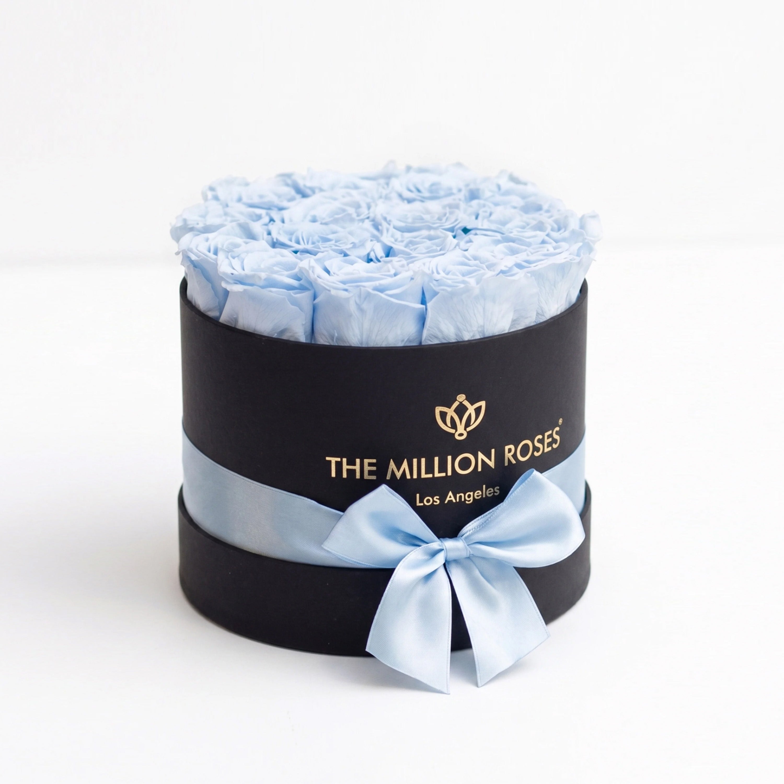Classic Black Box with 14-15 light blue roses arranged evenly inside a square black box
