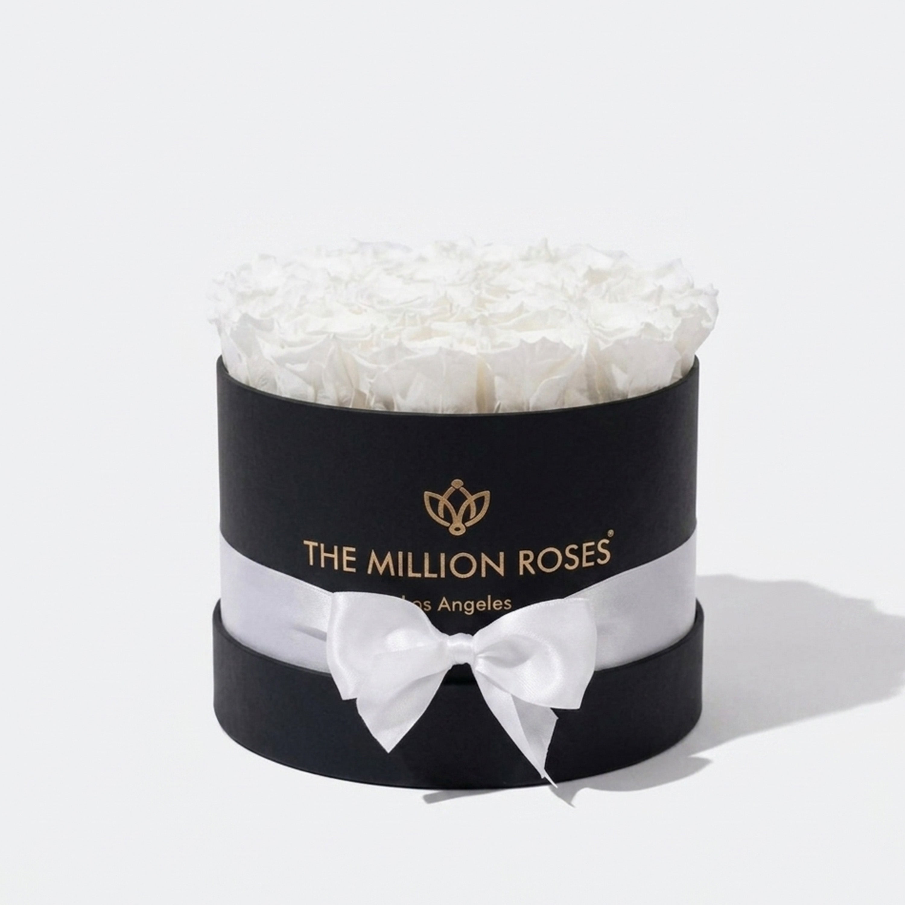 Classic Black Box with 14-15 white preserved roses arranged in a black square box