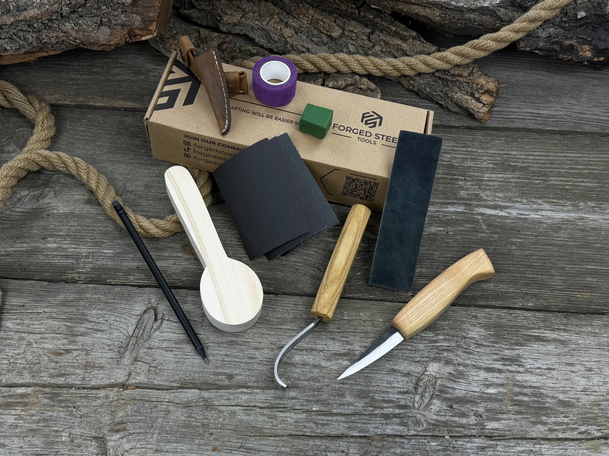Complete Spoon Carving Kit for Beginners with knives, wooden blank, sandpaper, and sharpening board