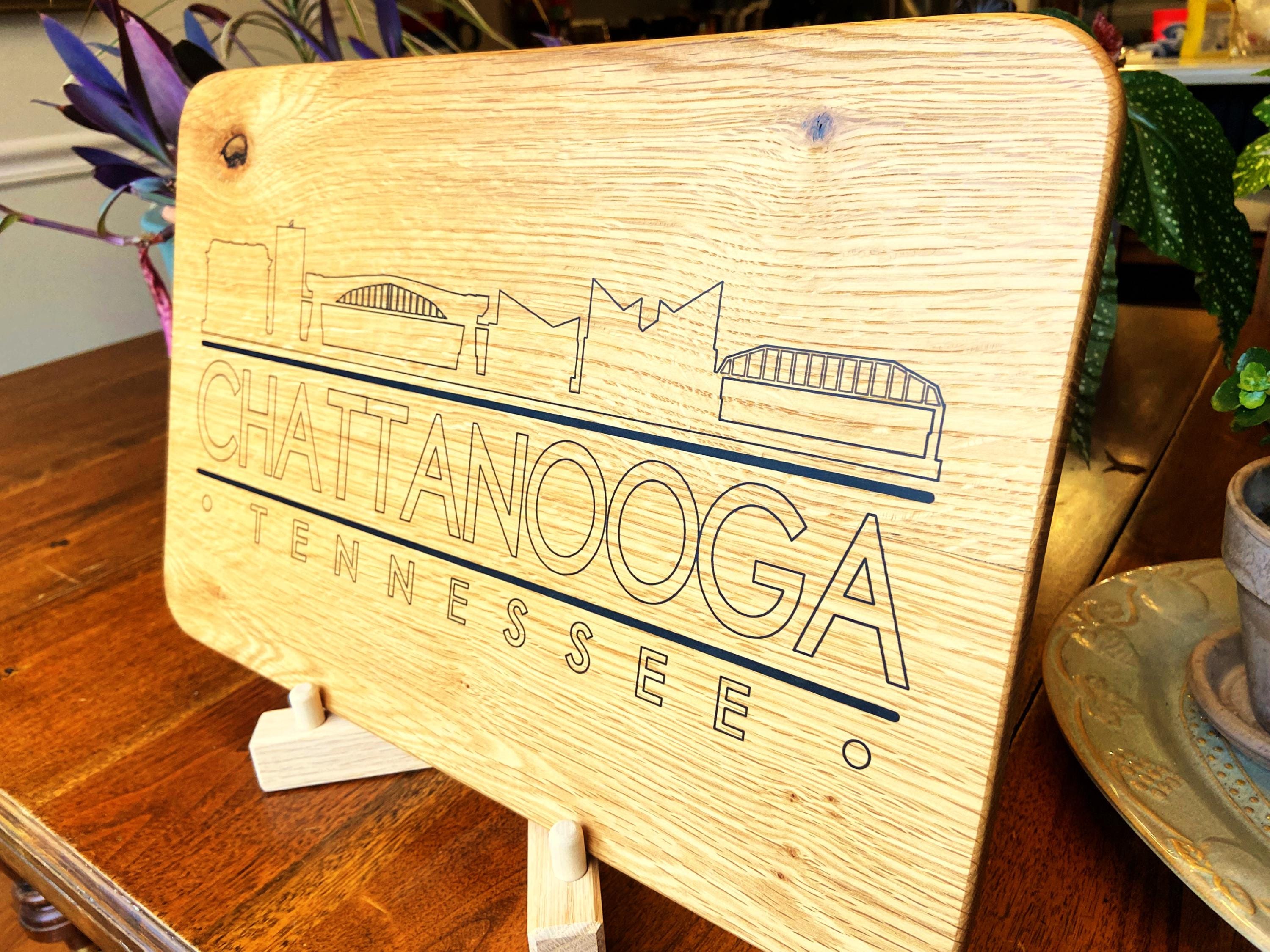 Handmade white oak charcuterie board with engraved Chattanooga skyline