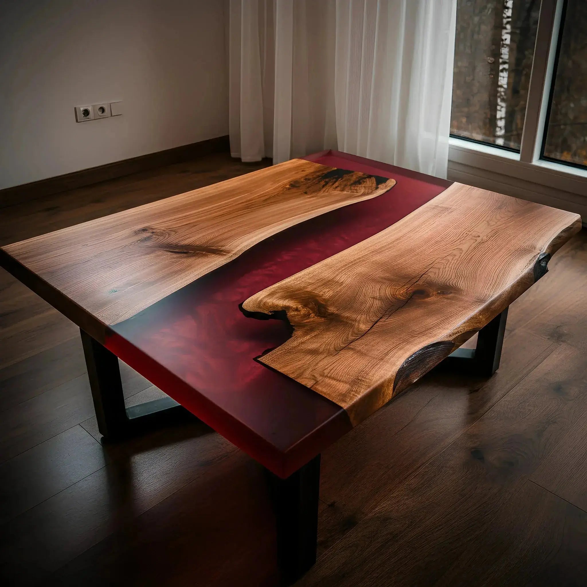 Handcrafted walnut and red resin epoxy coffee table in a minimalist room. Unique USA-made accent table with natural wood textures and bold color.