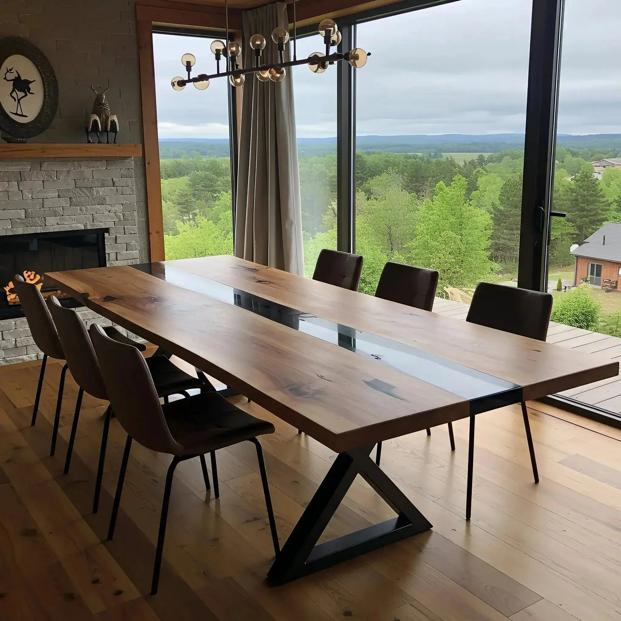 Handmade walnut and black resin dining table in a modern dining room, seating eight. Custom epoxy black dining table with sleek metal base.