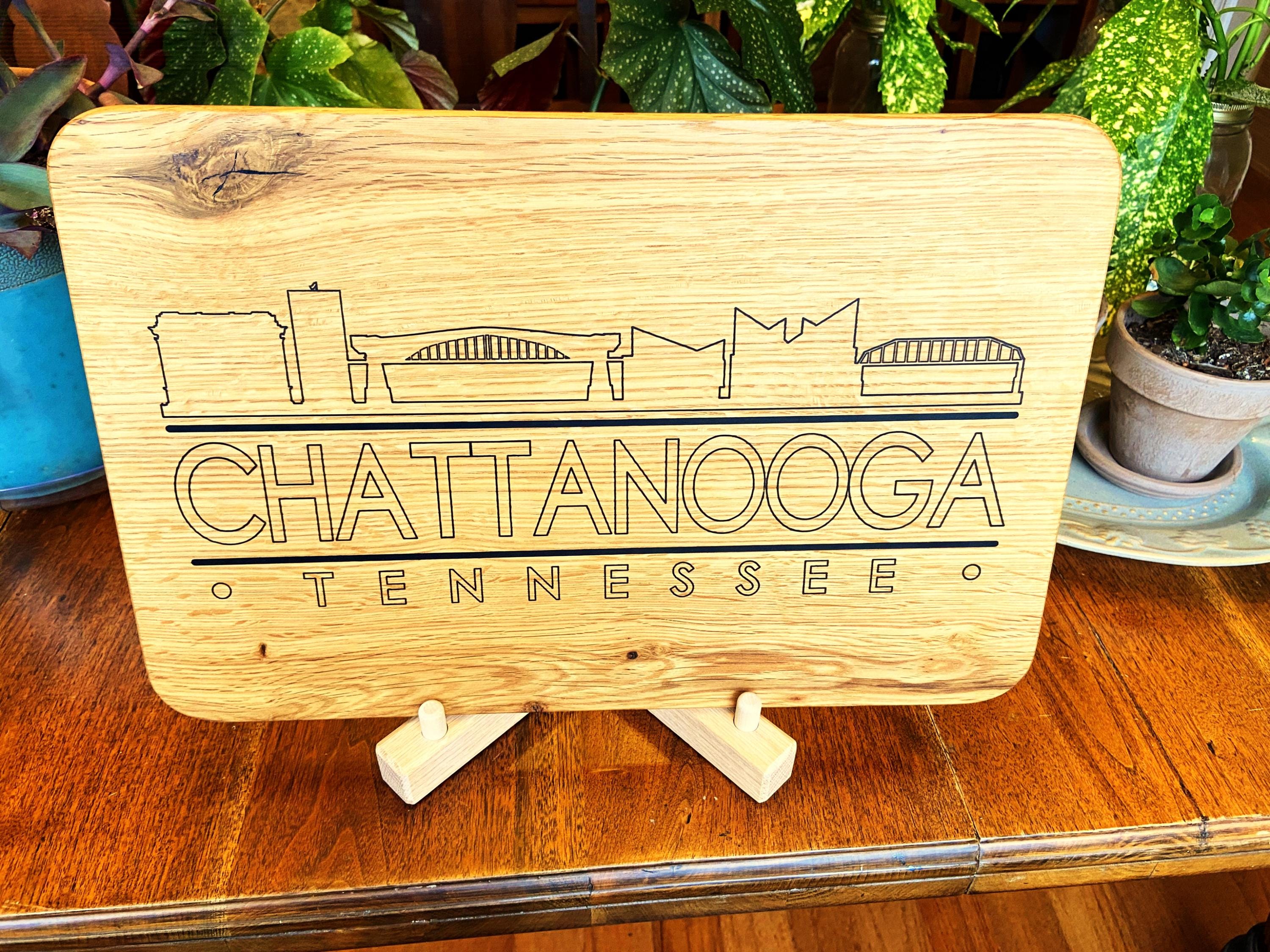 Handmade white oak charcuterie board with engraved Chattanooga skyline