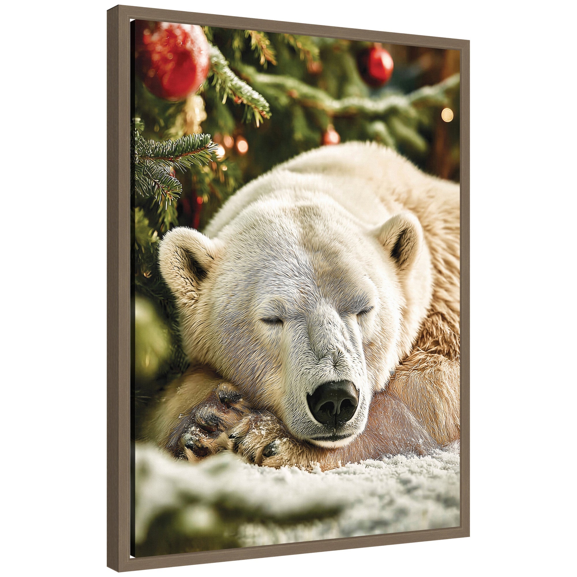 Framed canvas art showing a polar bear sleeping beneath a decorated Christmas tree with ornaments on snow-covered ground.