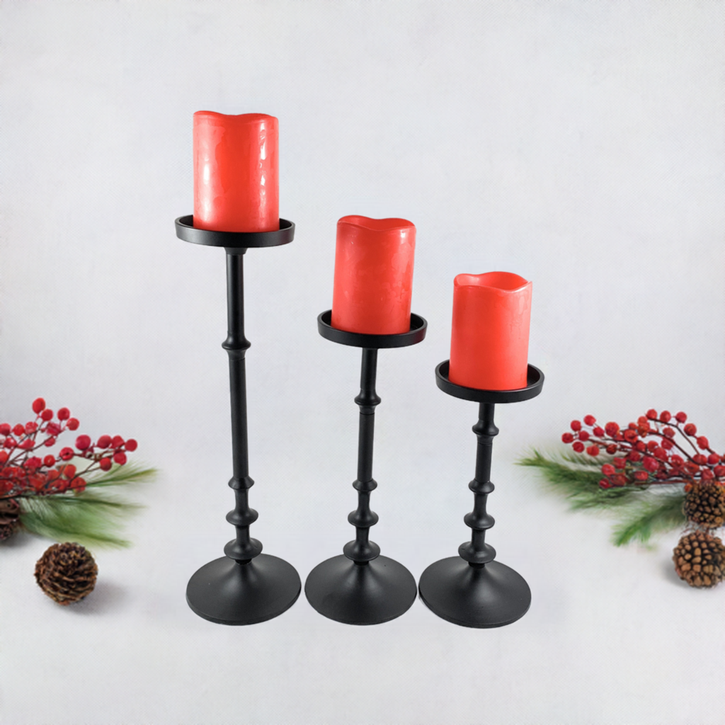Vibhsa Candle Holders Set of 3 in matte black aluminum with varying heights and circular bases