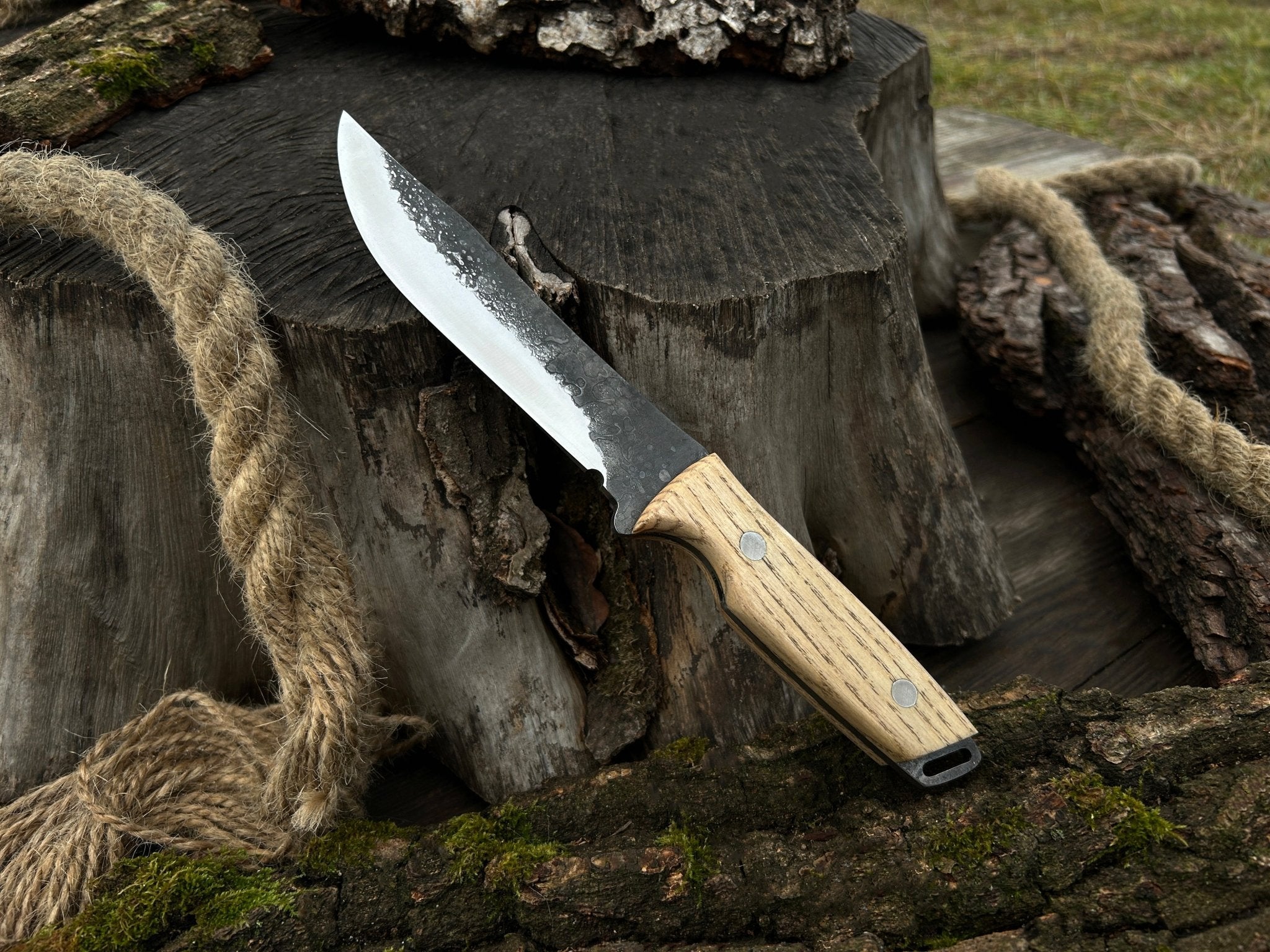 Hand-Forged Bushcraft Knife with 12 cm carbon steel blade and ash wood handle by Sharky Forged Steel Tools