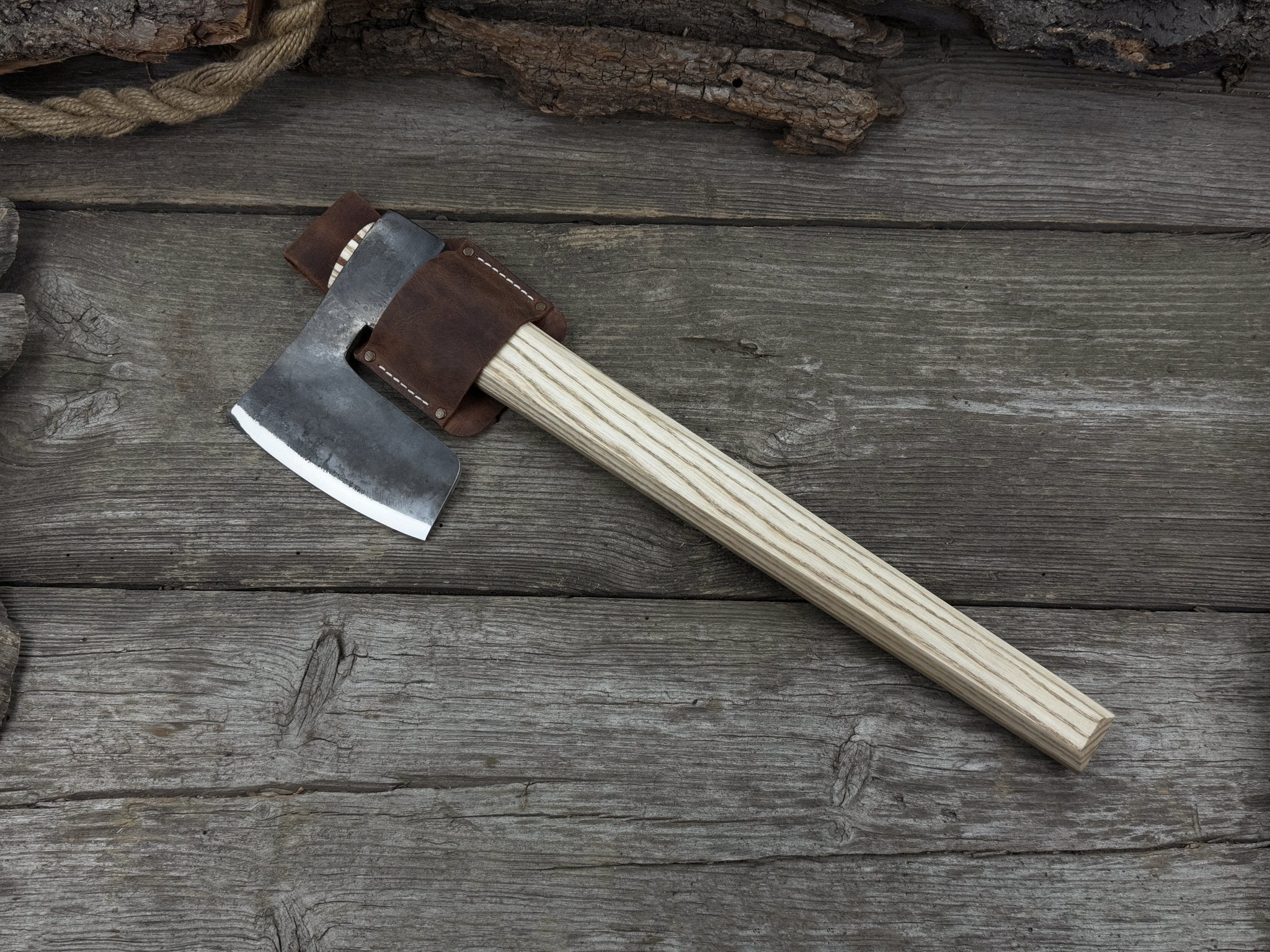 Hand-forged carpenter's axe with belt loop and leather sheath