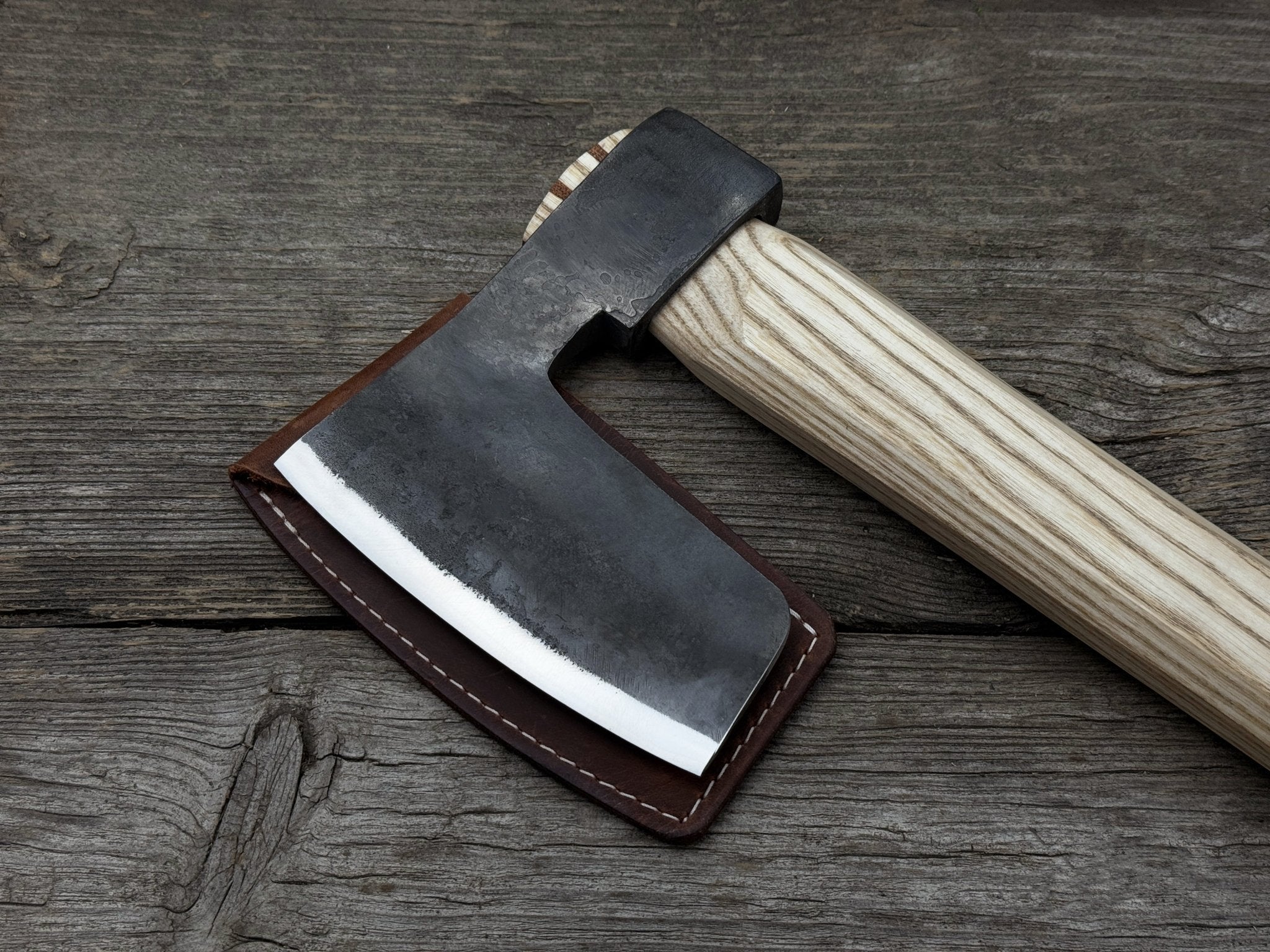 Hand-forged carpenter's axe with belt loop and leather sheath