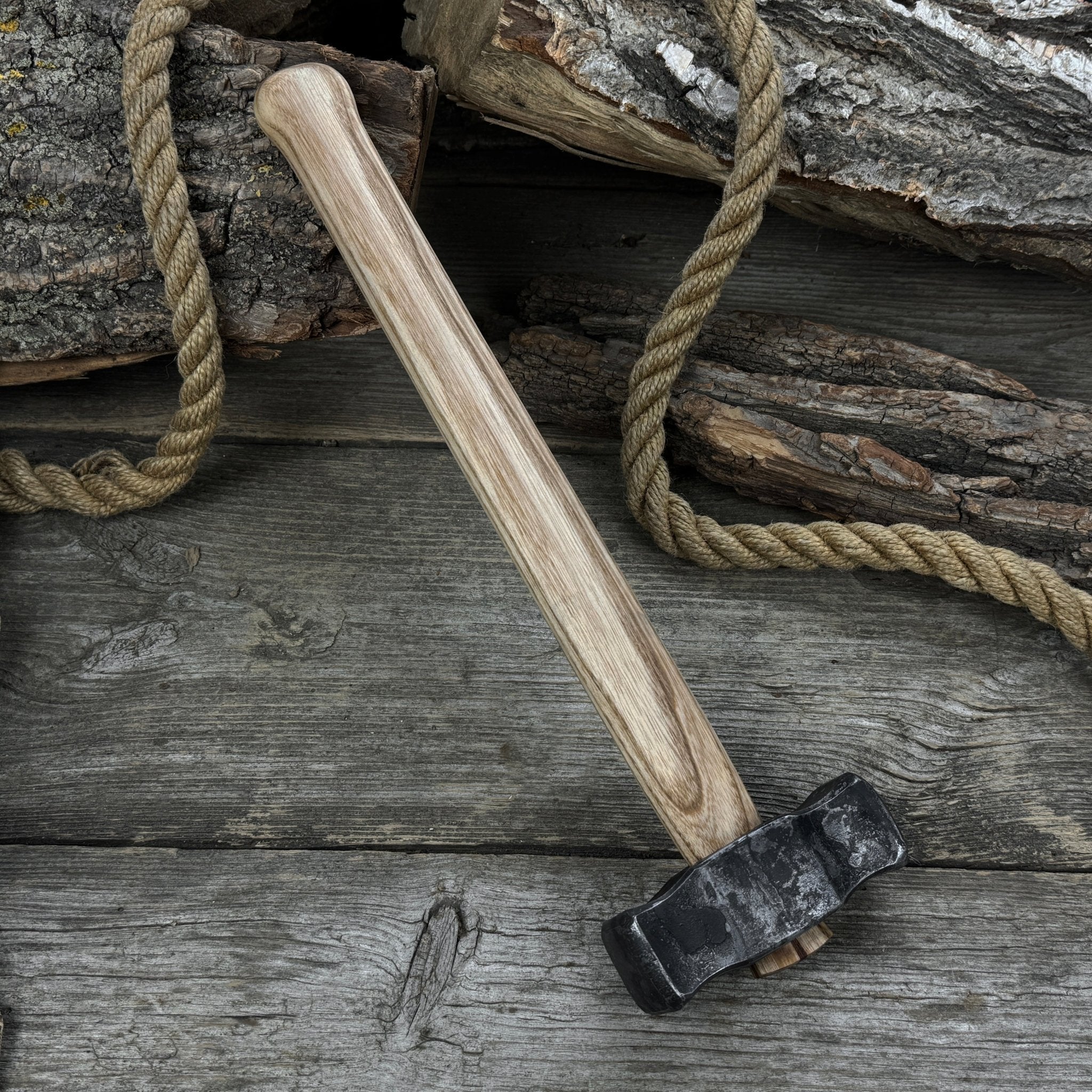 Hand-forged double blacksmith's hammer with ash wood handle and carbon steel head