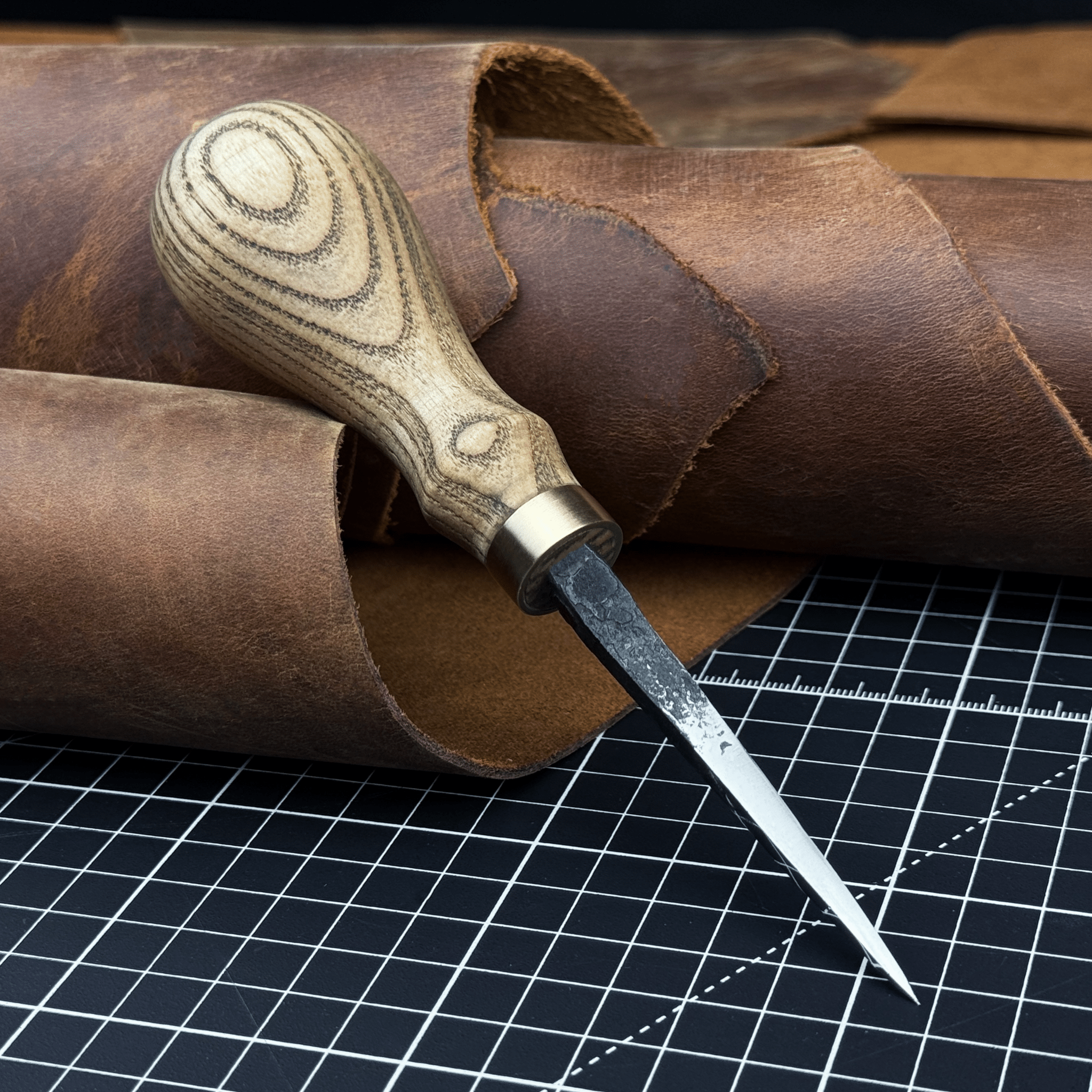 Hand-Forged Leather Awl with ash wood handle and high-carbon steel blade
