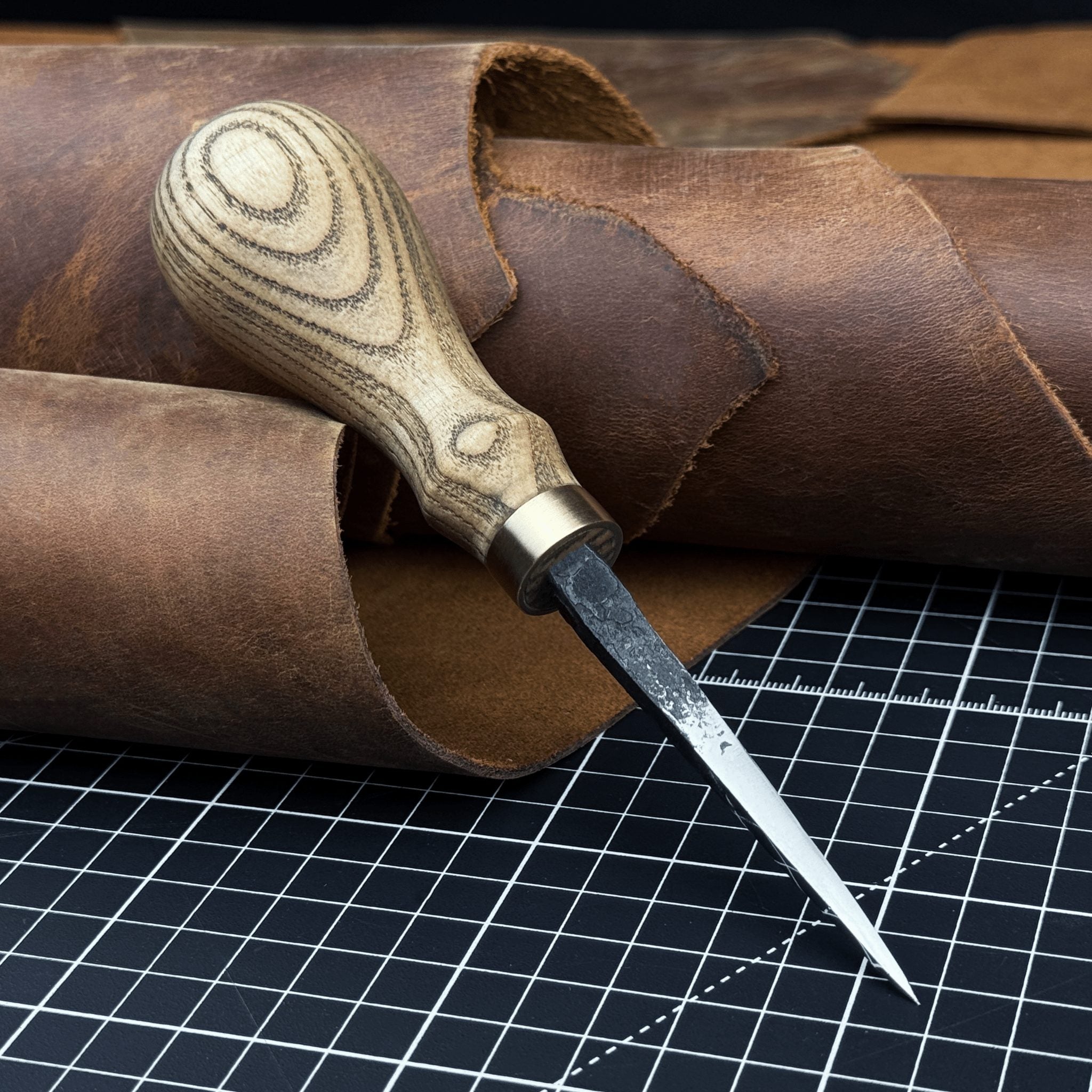 Hand-Forged Leather Awl with ash wood handle and high-carbon steel blade