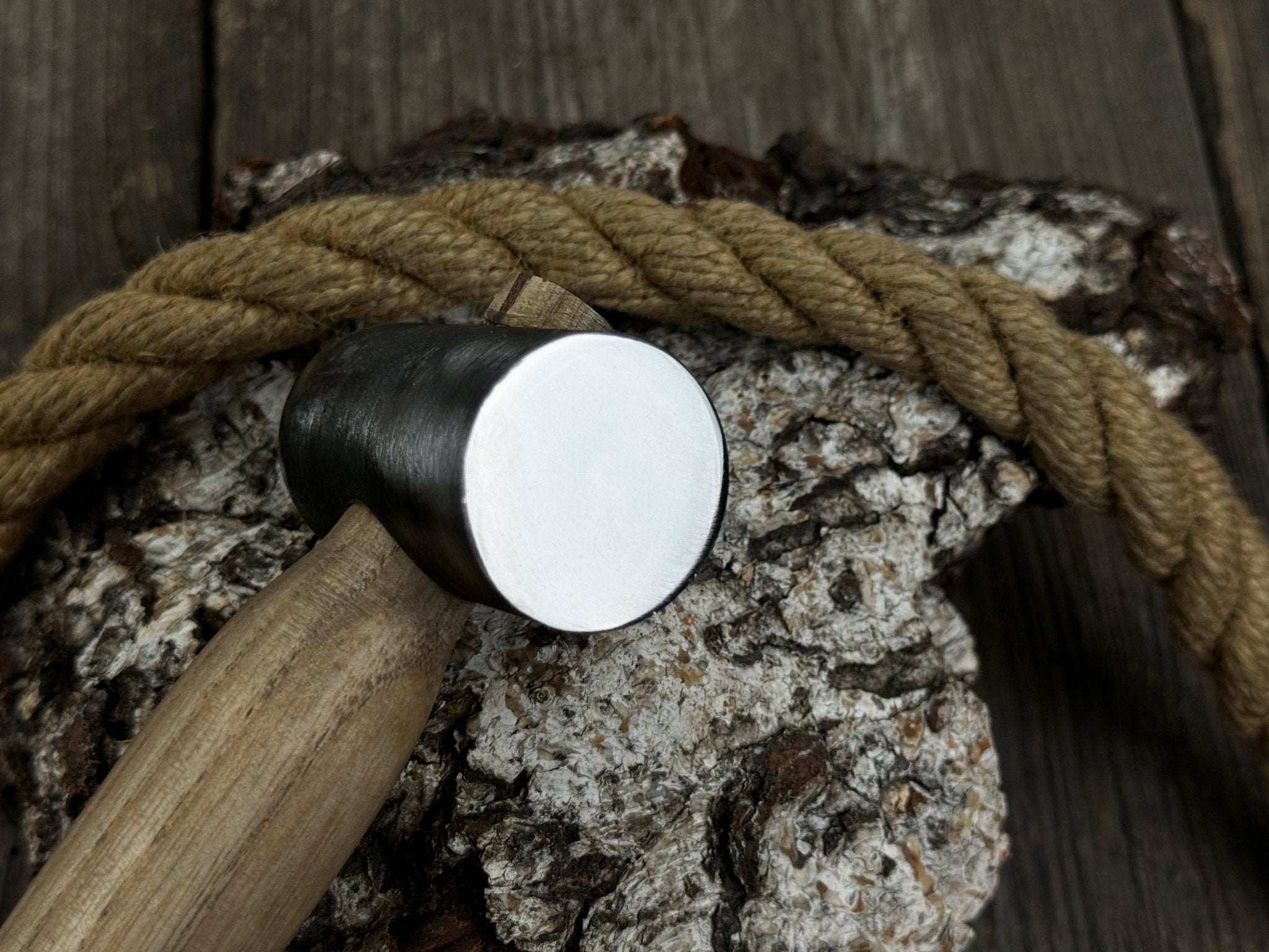 Hand-forged leather hammer with carbon steel head and ash wood handle