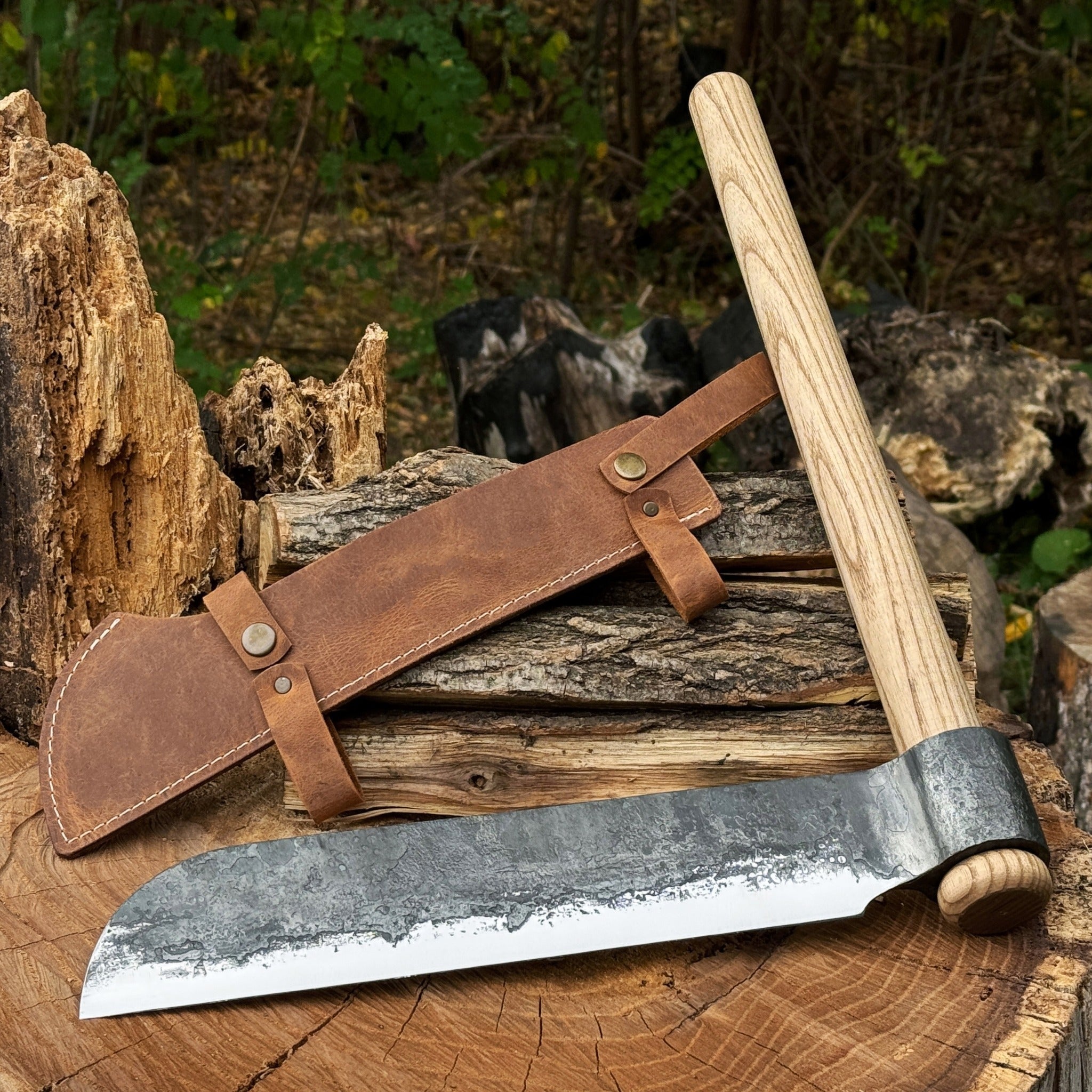 Hand-forged splitting froe with ash wood handle and leather sheath