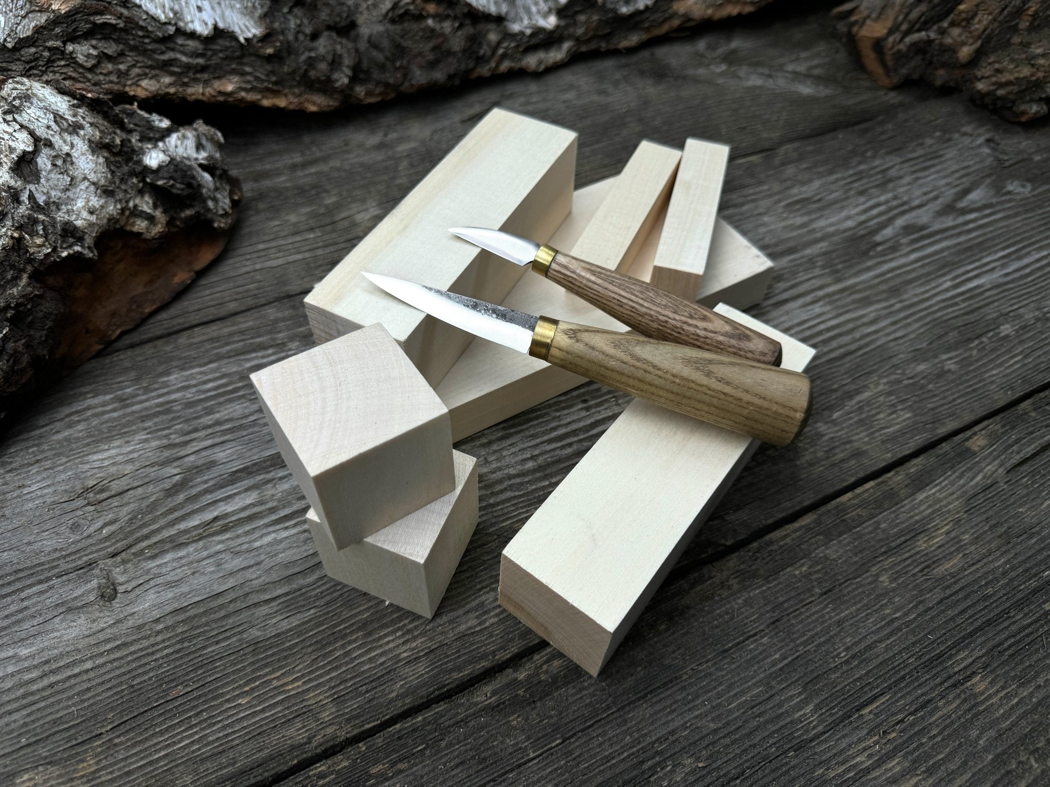Hand-forged wood carving tool set with two knives and wooden blanks