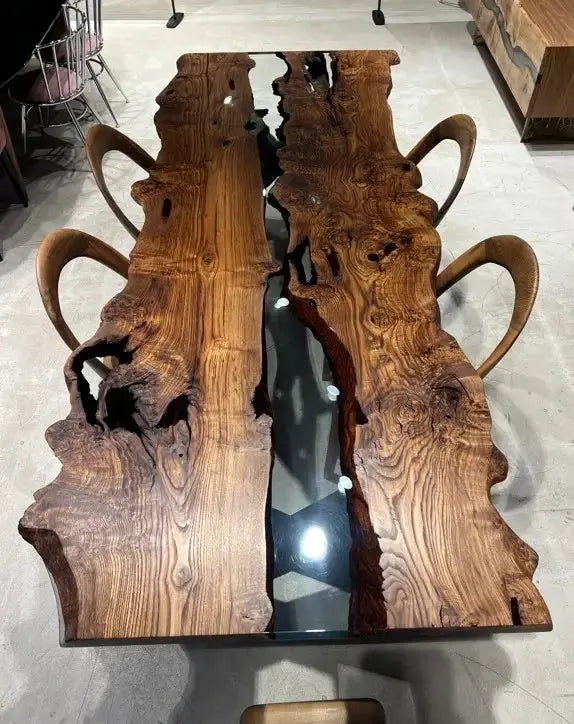 Live edge chestnut wood dining table with epoxy resin river and black legs