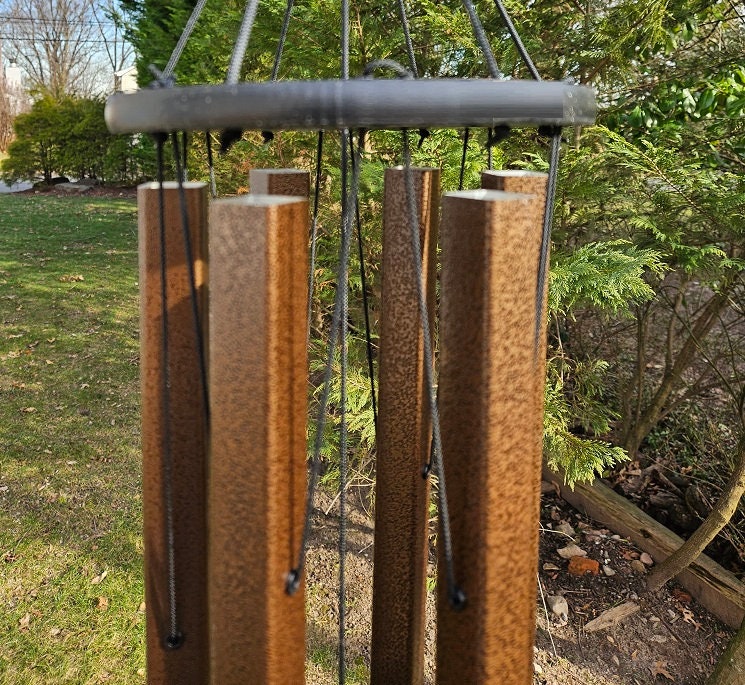 Amish handmade square aluminum wind chimes in outdoor garden setting