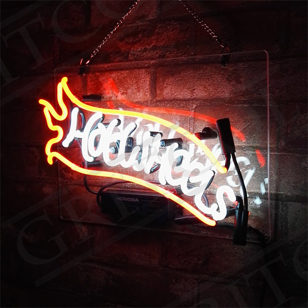 Hot Wheels Neon Sign glowing in red and orange colors mounted on acrylic backing