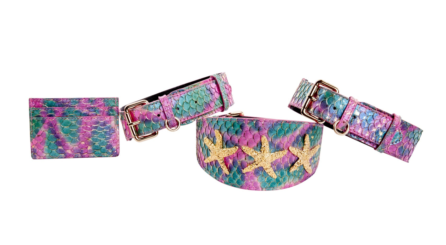 Four-piece pet accessory set with custom colored tilapia material and gold hardware laid out on a white surface