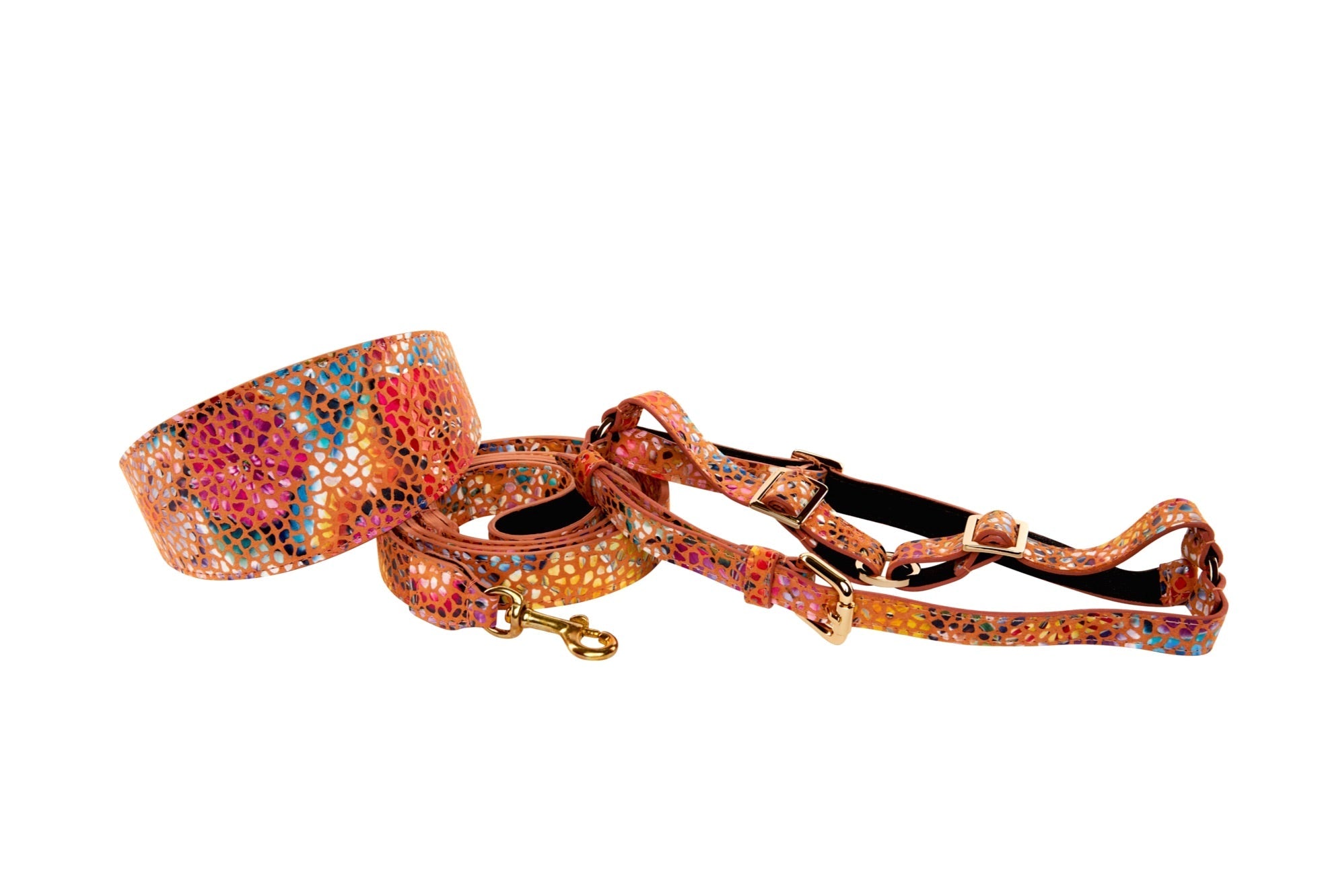 Orange floral mosaic patterned Italian leather collar, harness, and leash set displayed on a neutral surface