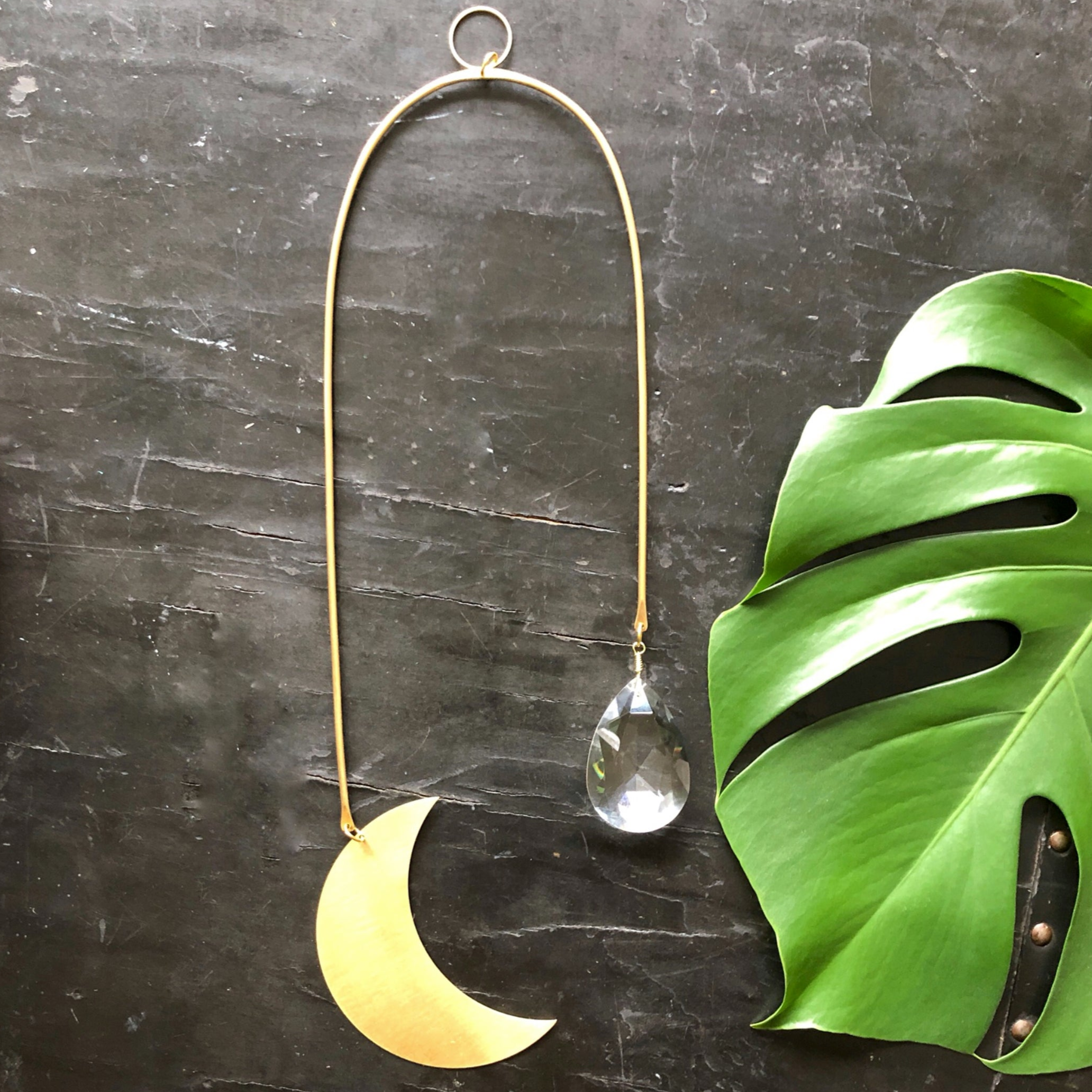 Illuminate Suncatcher featuring hand forged brass wire and vintage faceted crystal