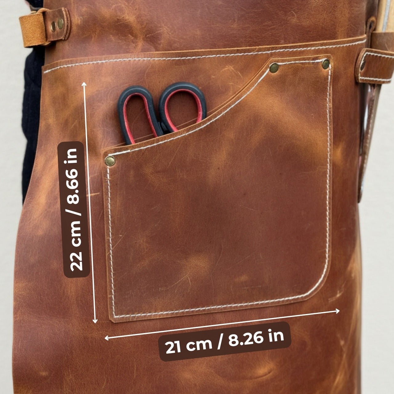Handcrafted leather work apron with adjustable straps and front pockets by Sharky Forged Steel Tools