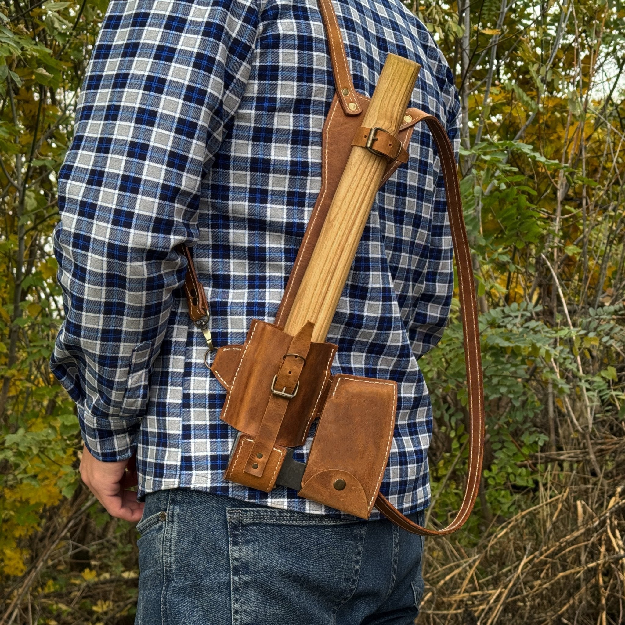 Leather axe case with adjustable shoulder straps by Sharky Forged Steel Tools