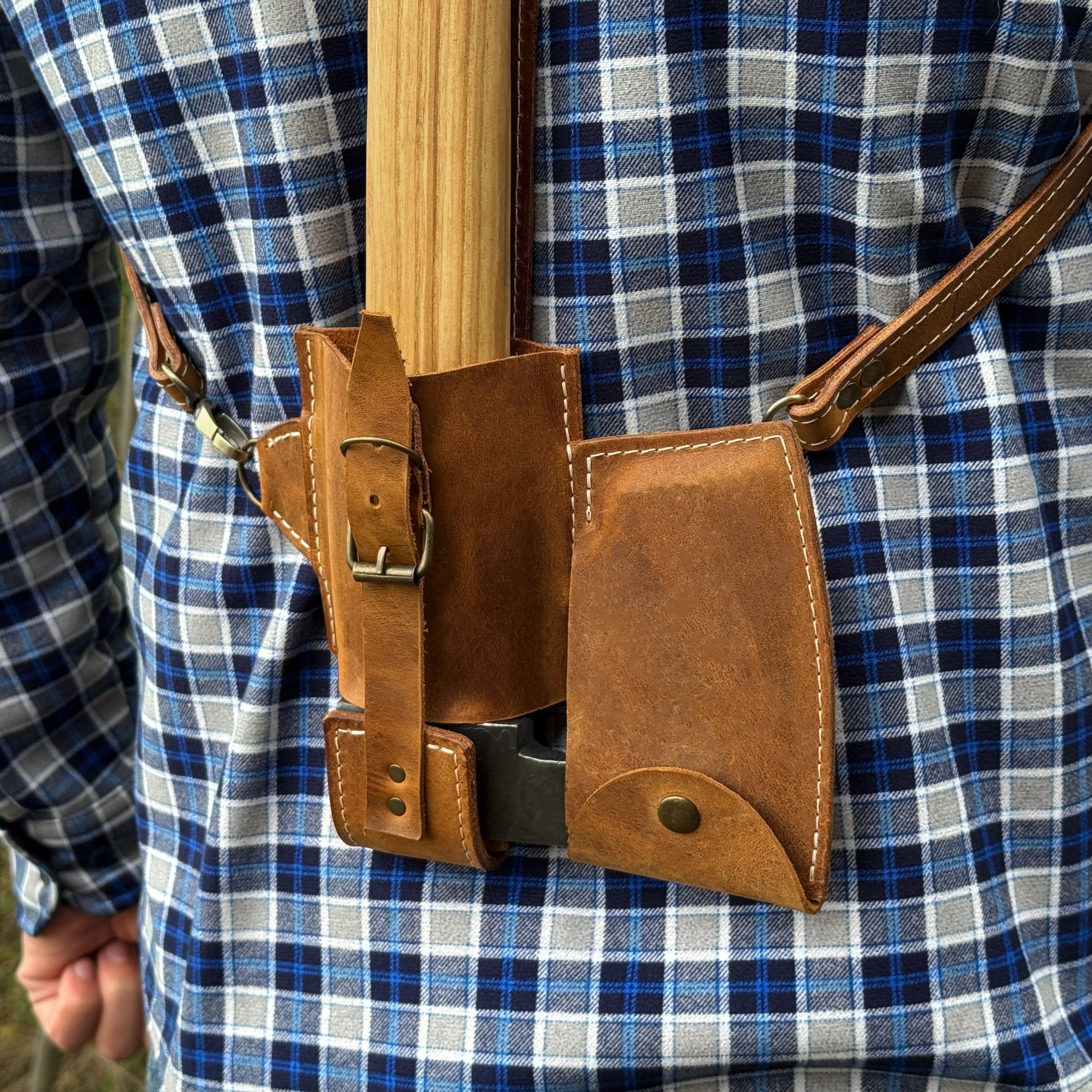 Leather axe case with adjustable shoulder straps by Sharky Forged Steel Tools