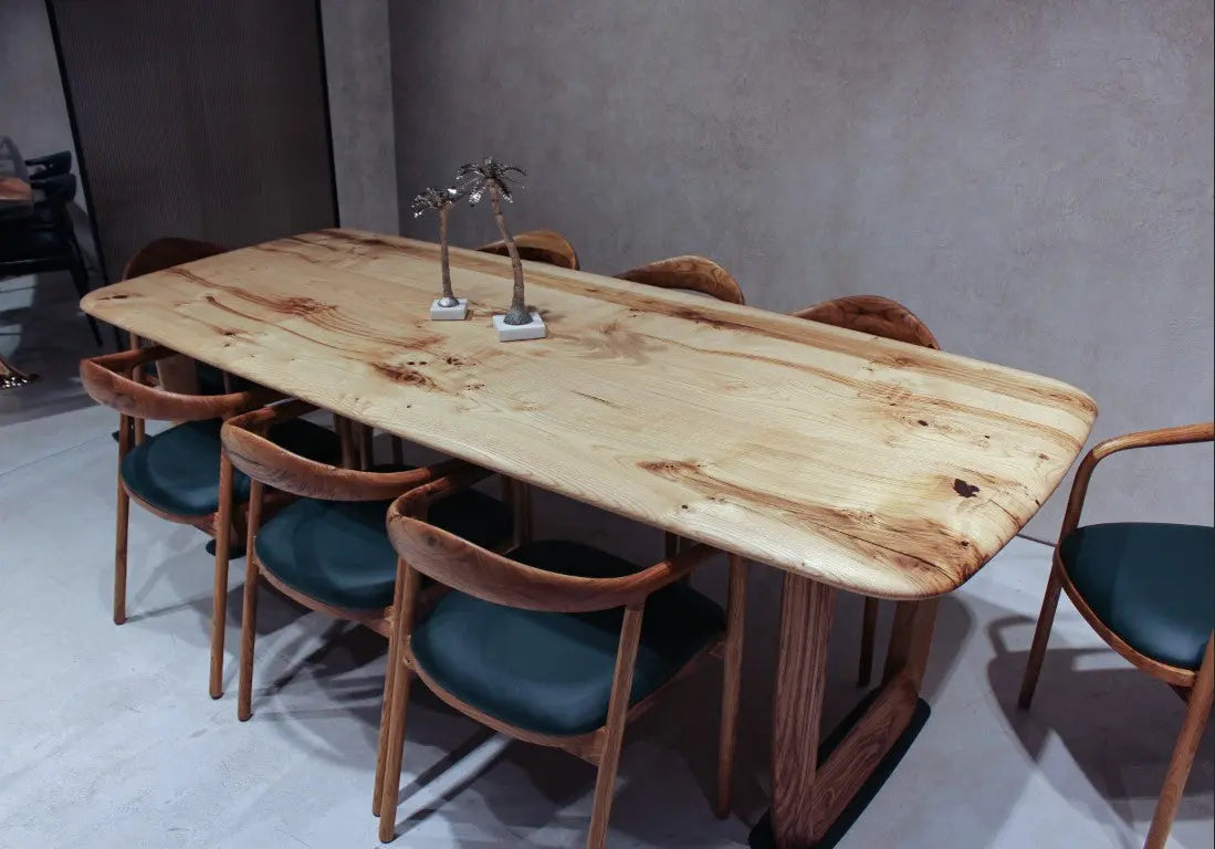 Rustic solid chestnut wood dining table with chestnut legs showing natural grain and knots