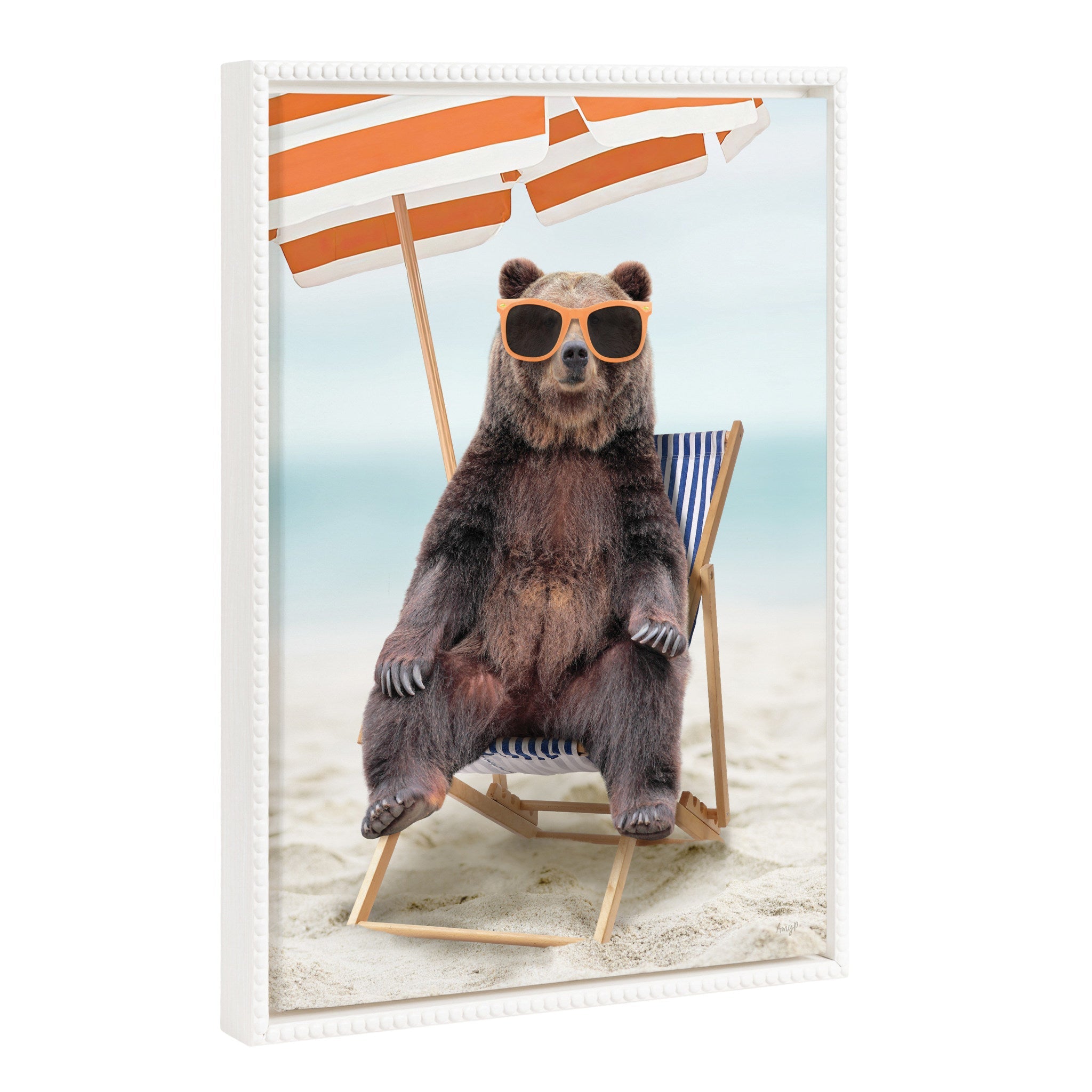 Sylvie Beaded Beach Chair Bear framed canvas art depicting a bear seated in a beach chair with a vintage beaded frame