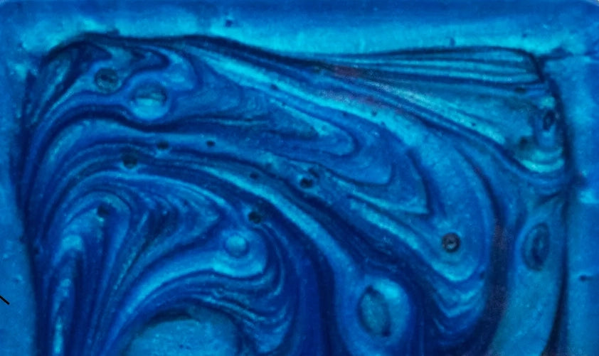 Epoxy Resin Blue Pigment Close Over View Showing The Blue Swirl Color and design of the epoxy resin.
