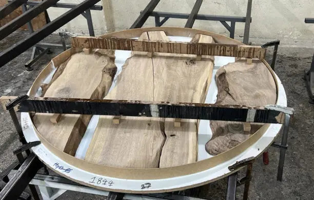 Round epoxy resin dining table with walnut wooden vortex base