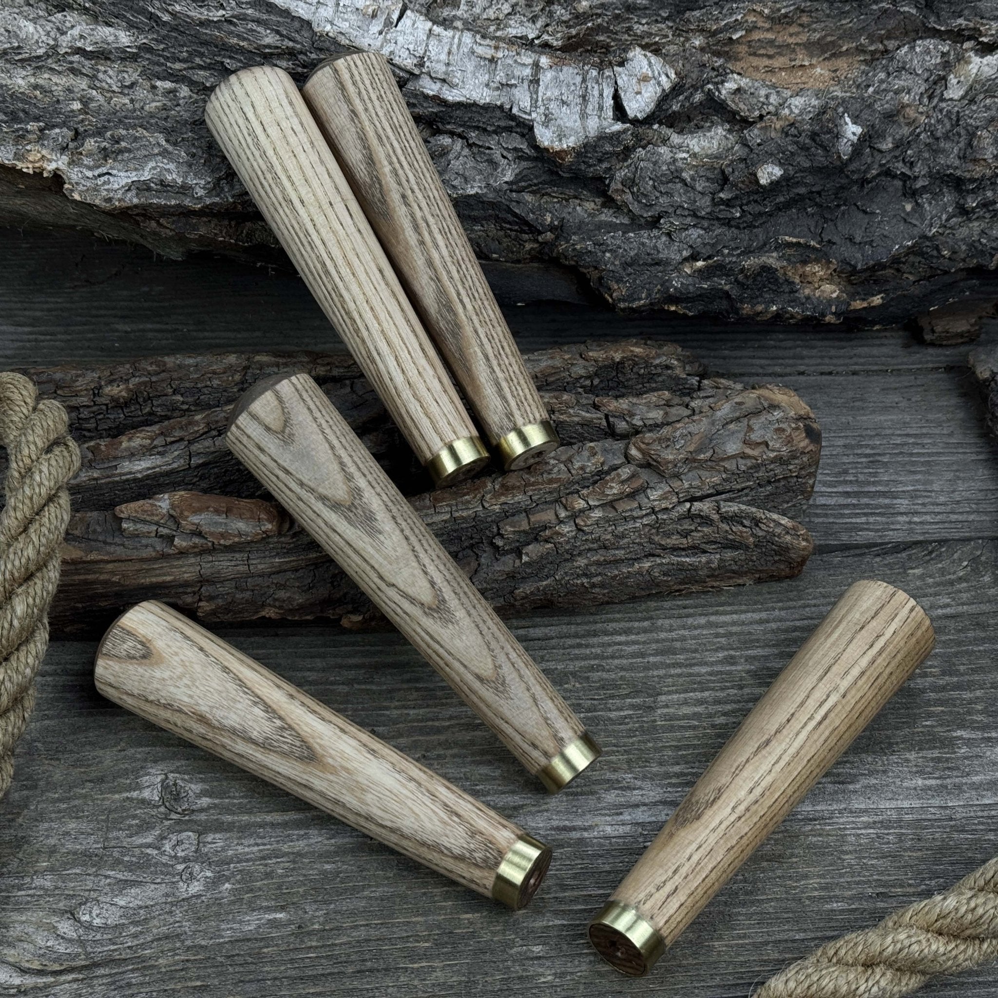 Set of 5 tapered ash wood tool handles with brass rings by Sharky Forged Steel Tools