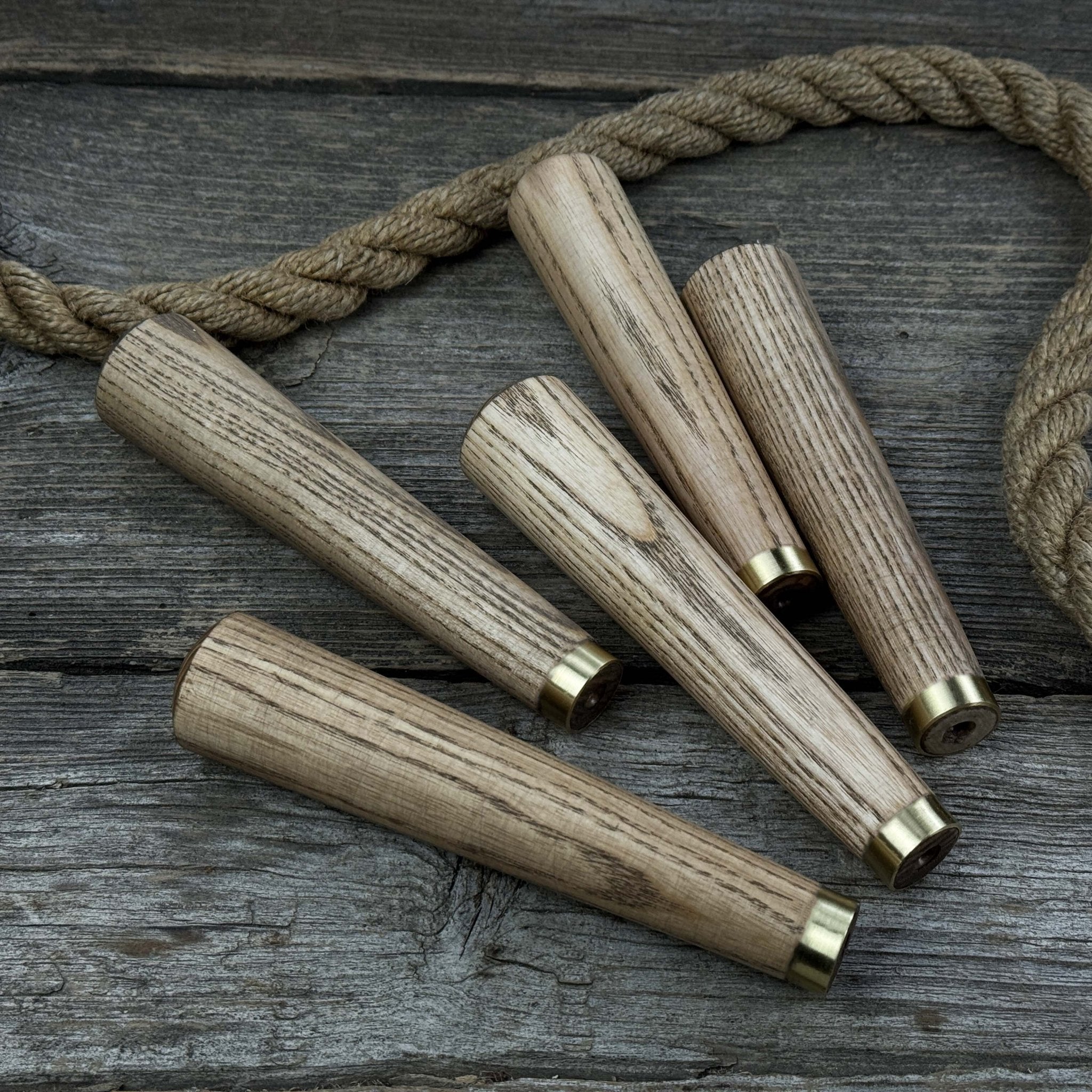 Set of 5 tapered ash wood tool handles with brass rings by Sharky Forged Steel Tools