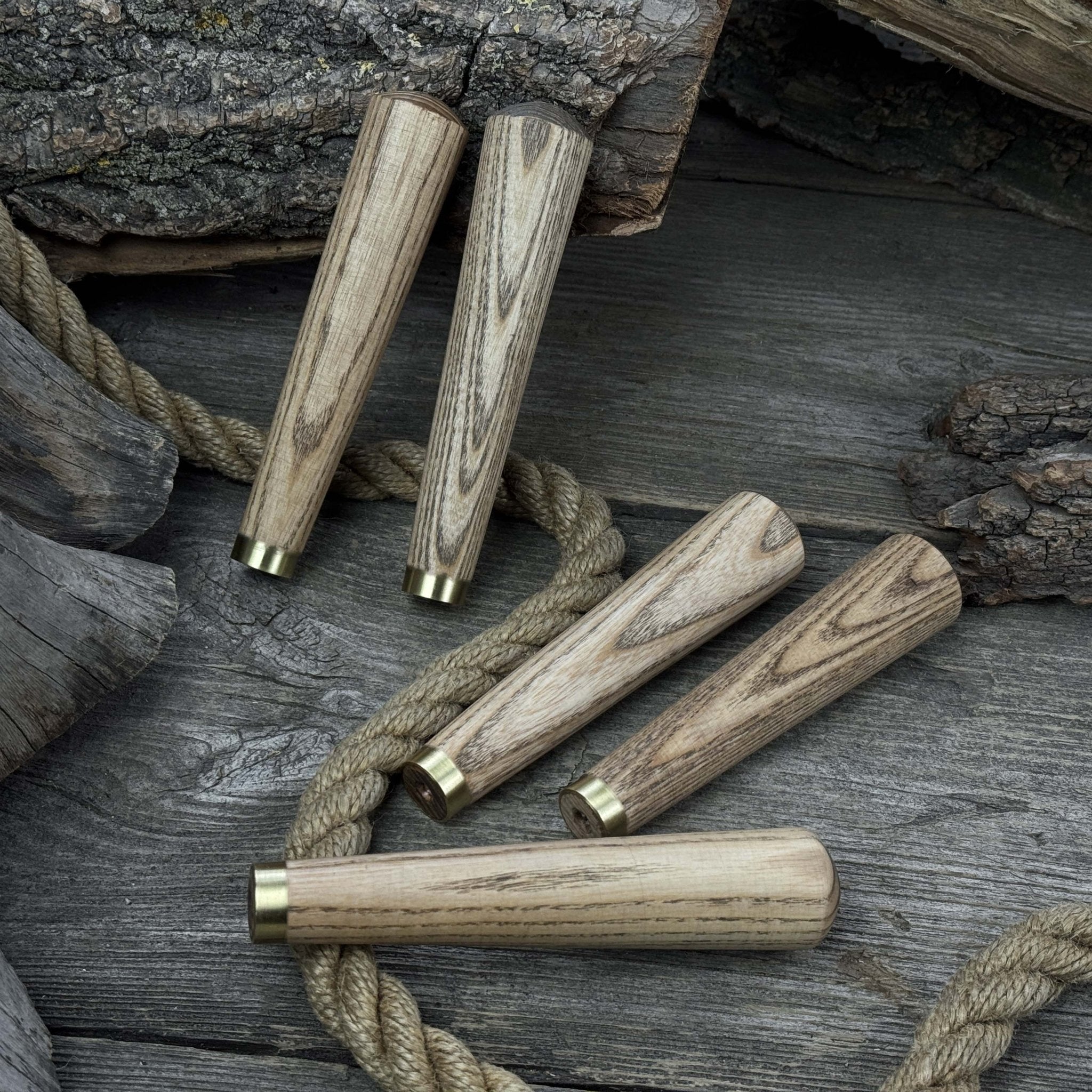 Set of 5 tapered ash wood tool handles with brass rings by Sharky Forged Steel Tools
