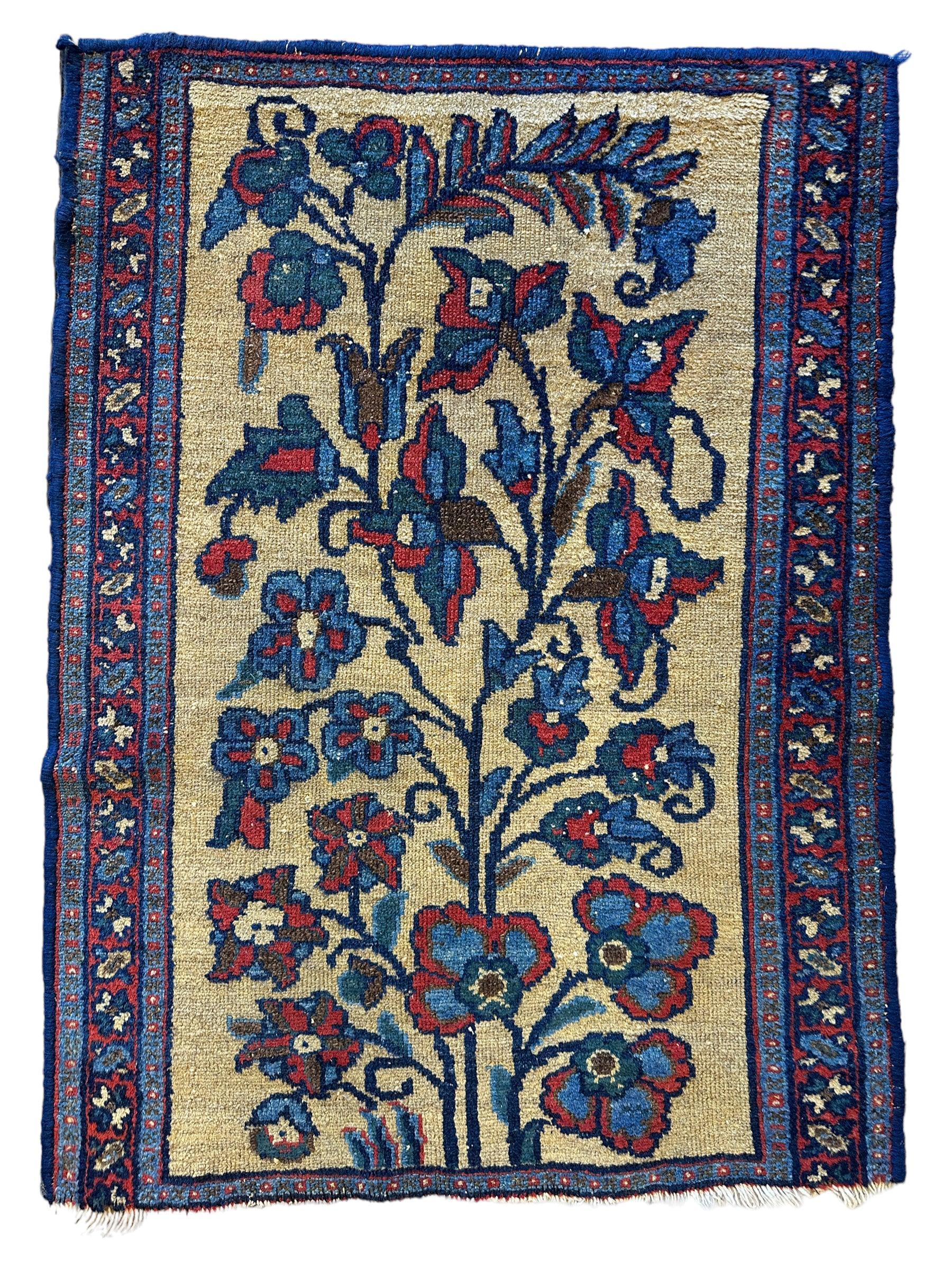 Small antique Persian Malayer Tree of Life rug in warm tones measuring 23 by 33 inches