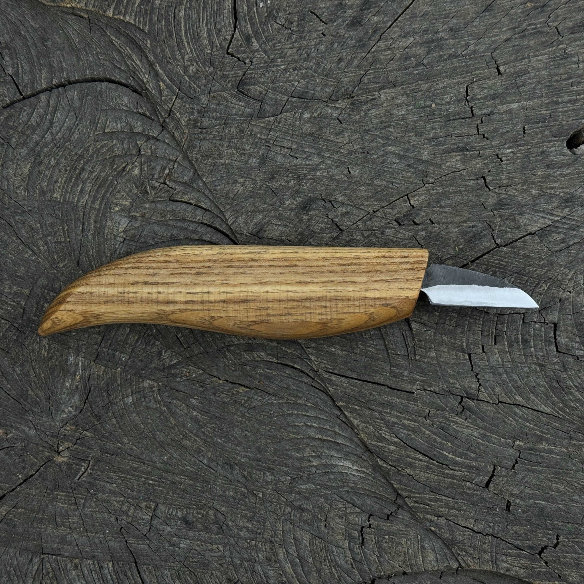 Small whittling carving knife with fine-tipped blade and ergonomic ash wood handle by Sharky Forged Steel Tools