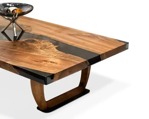 Handcrafted resin coffee table with smoke-colored resin river and solid walnut legs