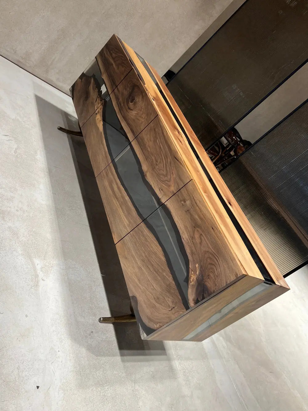 Osso collection resin credenza sideboard with walnut doors and resin accents