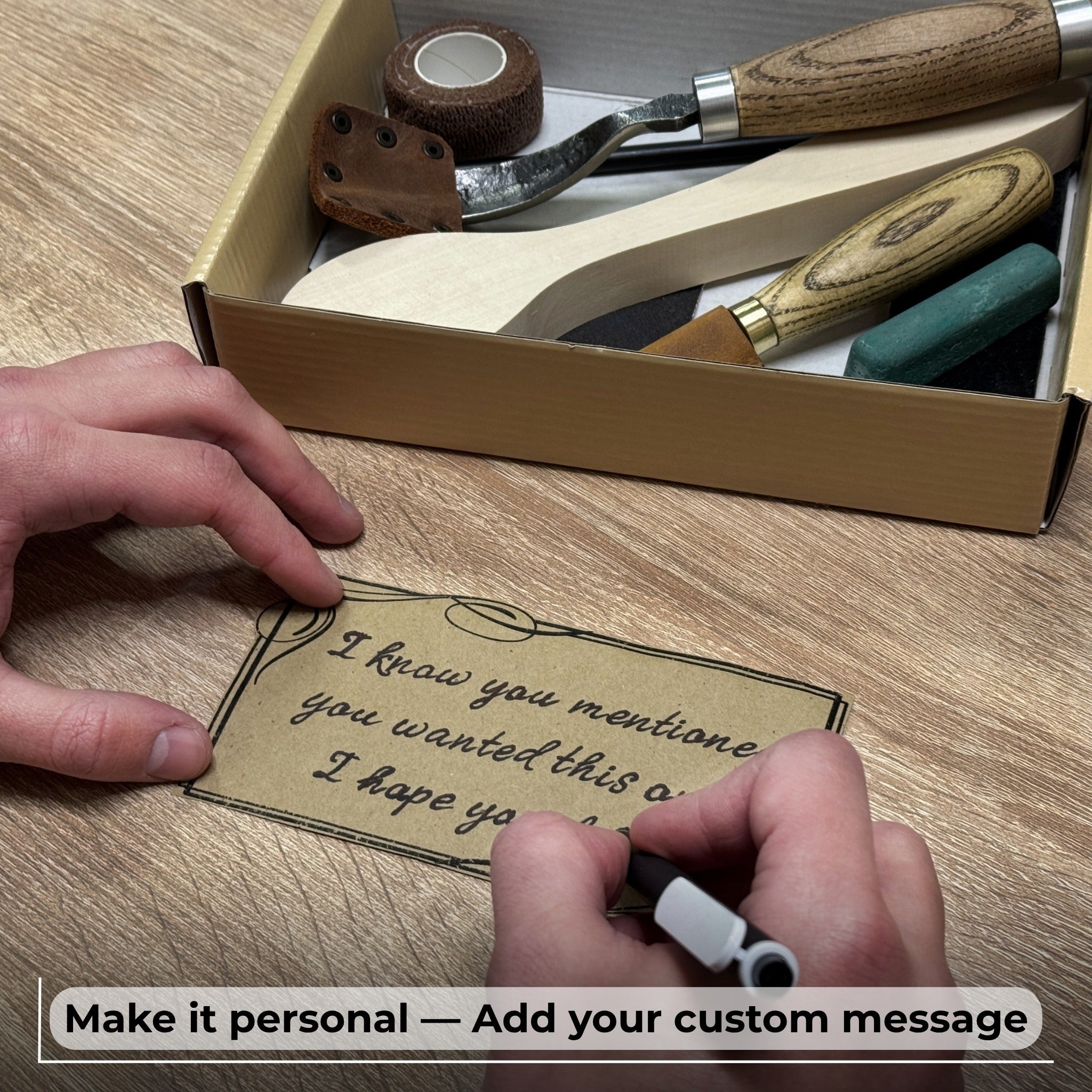 Complete Spoon Carving Kit with bent gouge, whittling knife, wooden blank, sandpaper, sharpening board, pencil, and finger wrap