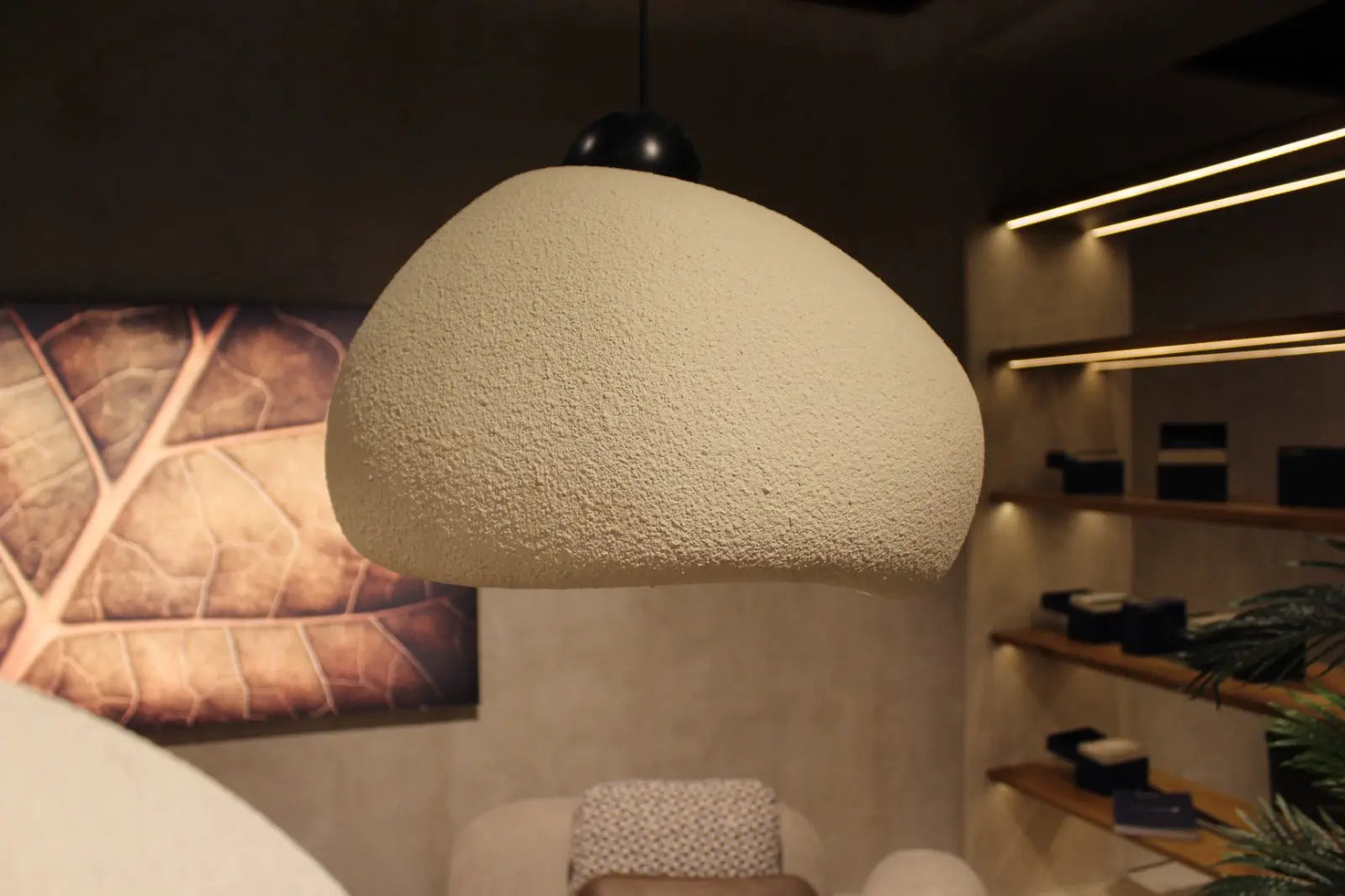Wabi Sabi Chandeliers decorative stone textured pendant light in warm interior setting