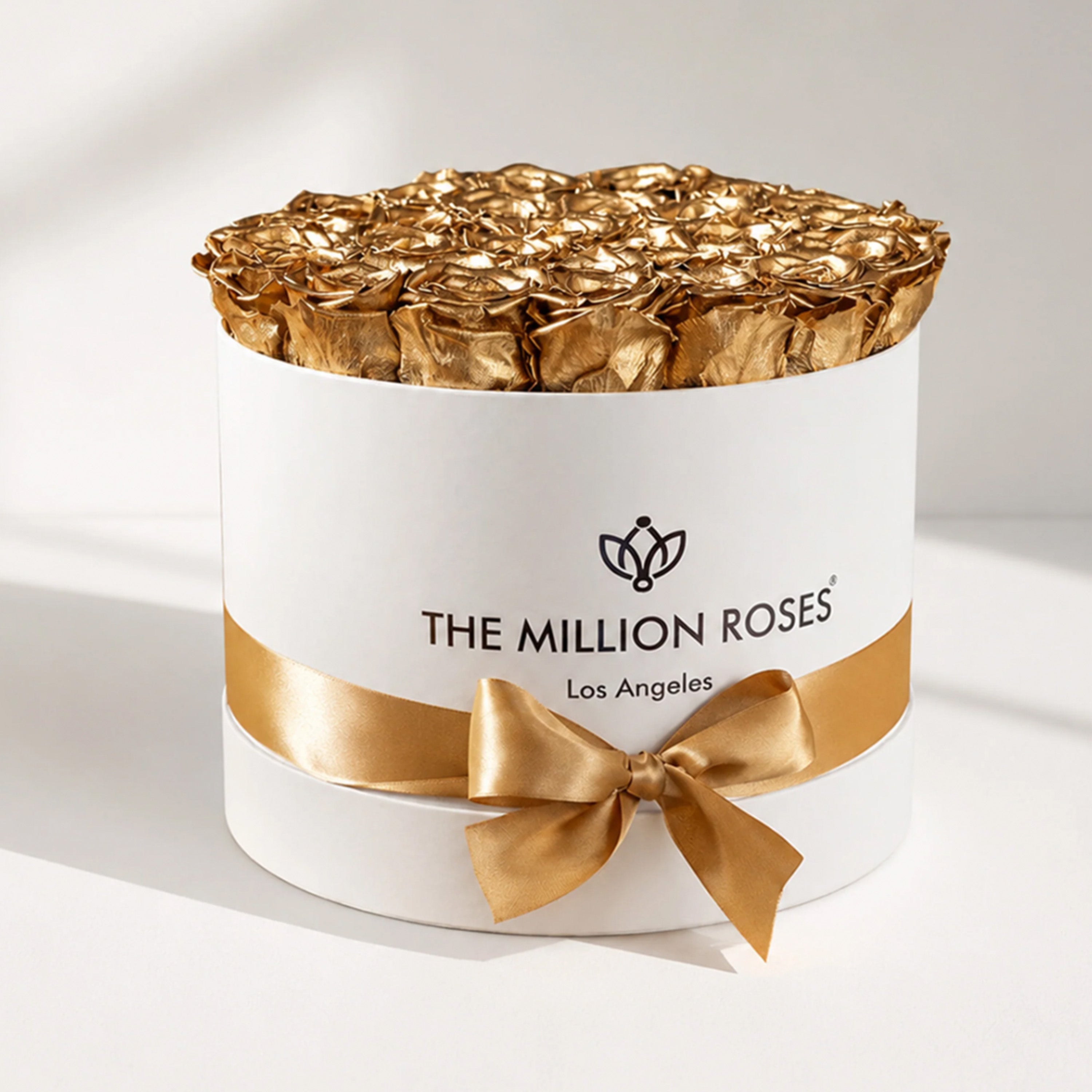 Supreme White Box containing 26-28 gold preserved roses in a white box