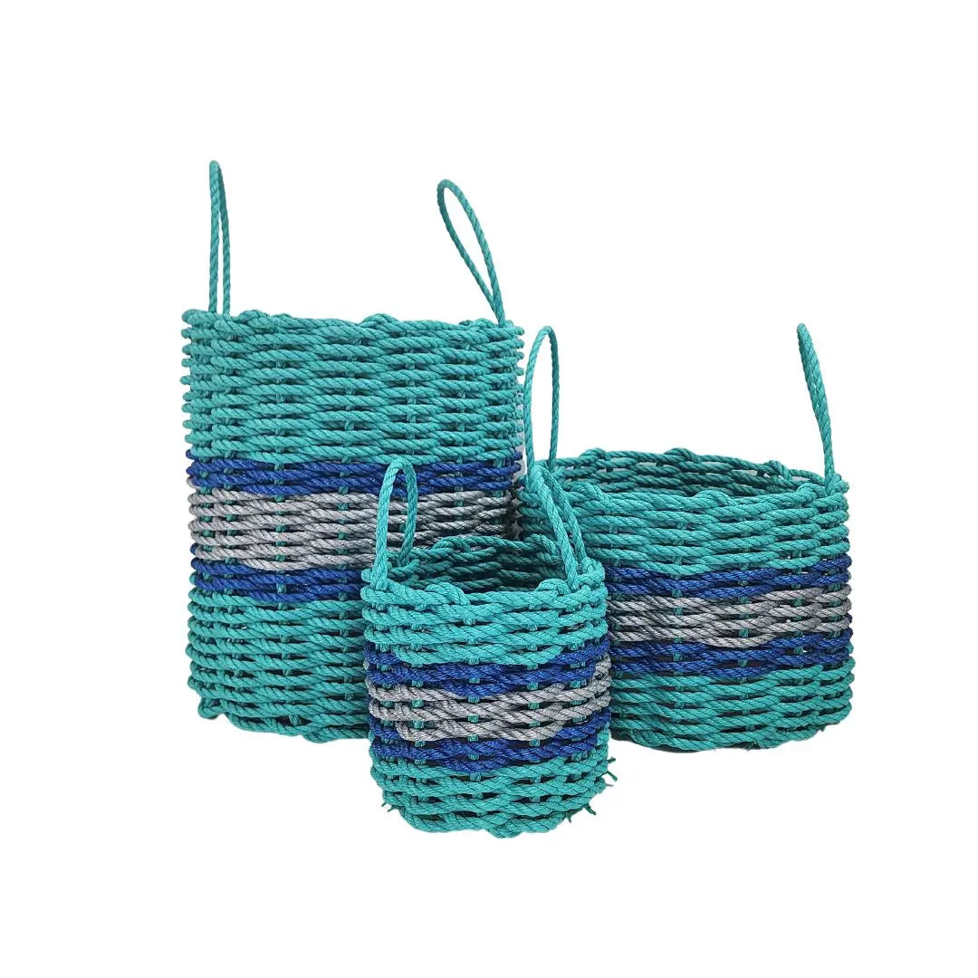 Handwoven storage basket made from Maine lobster rope in teal, light gray, and blue accents